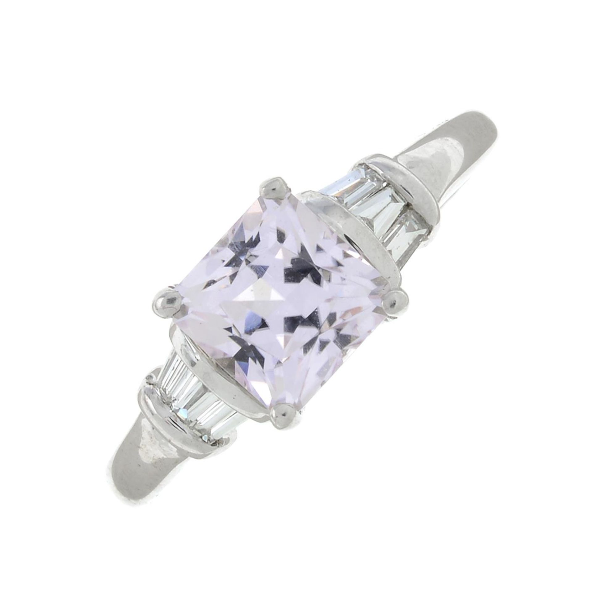 A 9ct gold kunzite and tapered baguette-cut diamond ring.Hallmarks for 9ct gold,