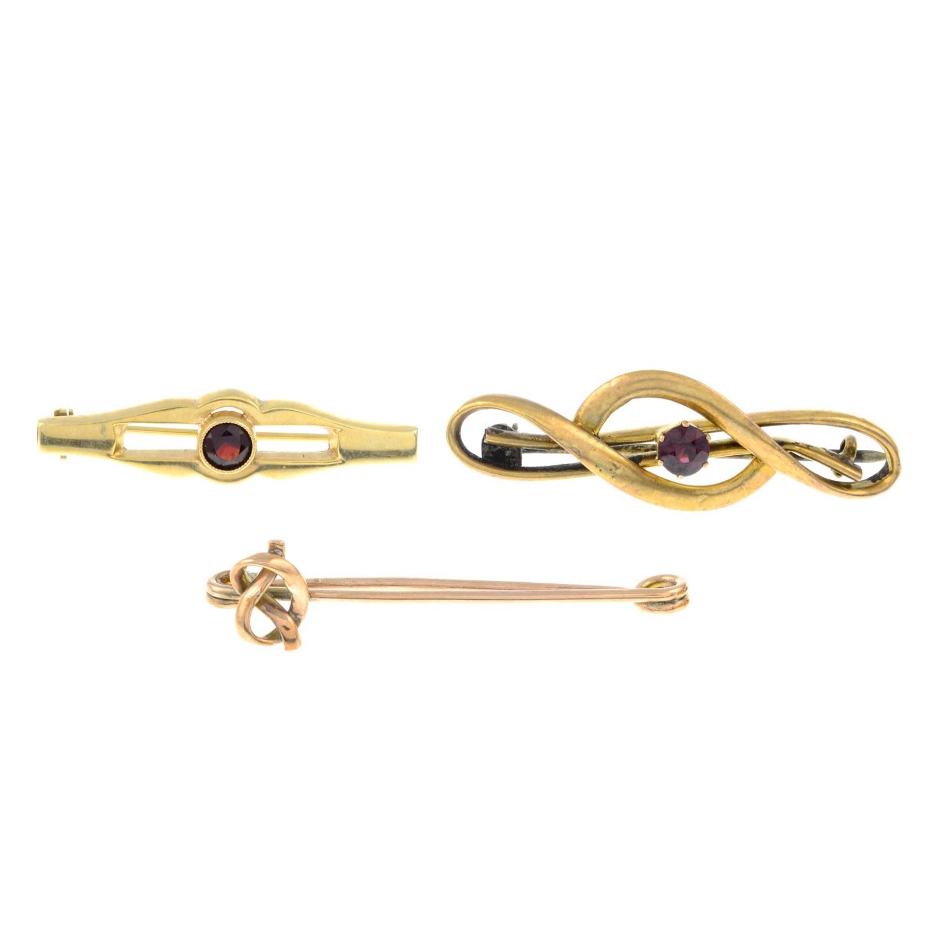 Two garnet bar brooches,