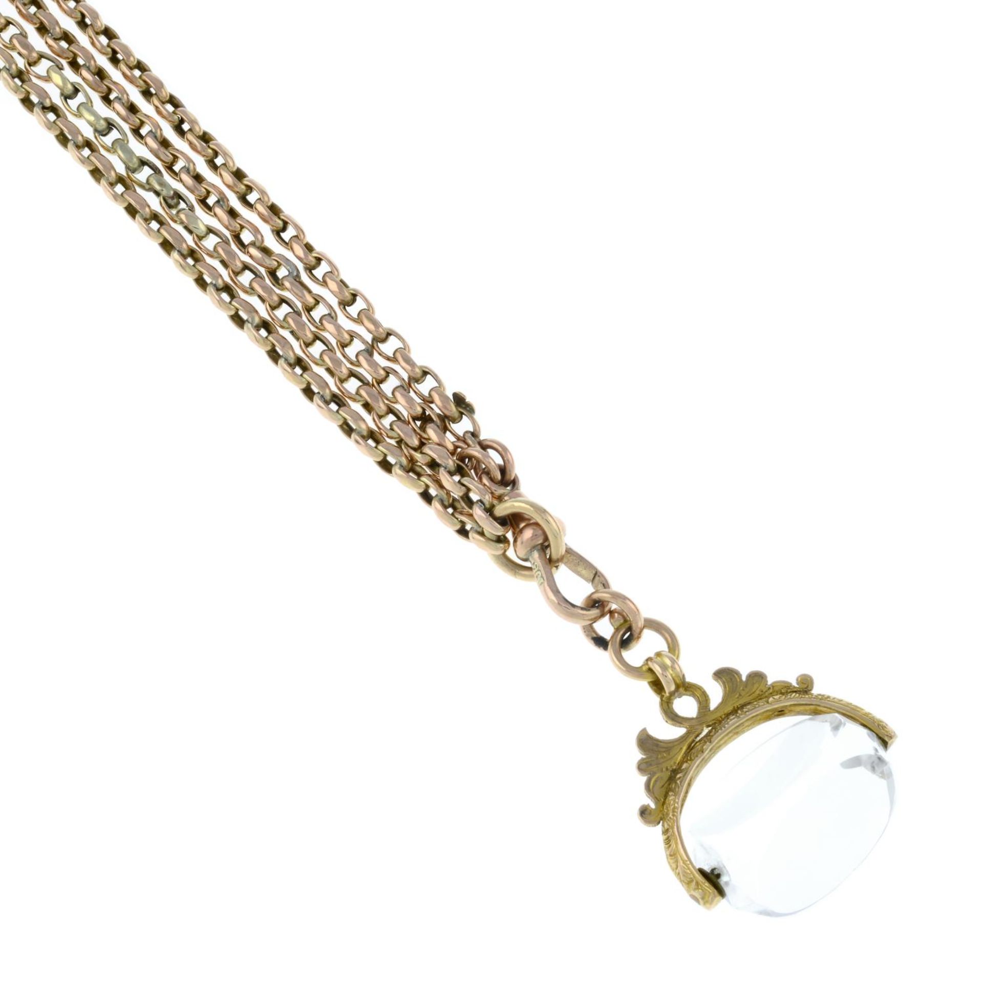 An early 20th century 9ct gold chain with rock crystal detachable fob.Stamped 9ct.Length of chain