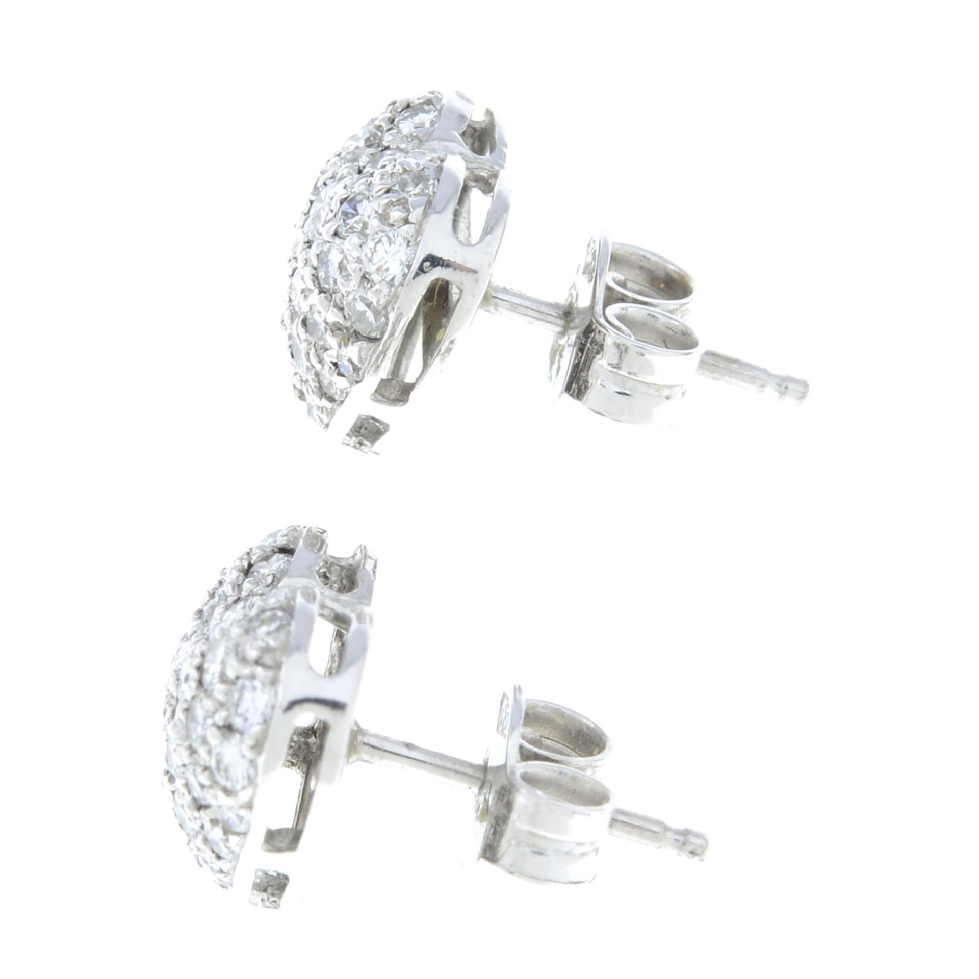 A pair of heart stud earrings.Estimated total diamond weight 0.60ct. - Image 2 of 2