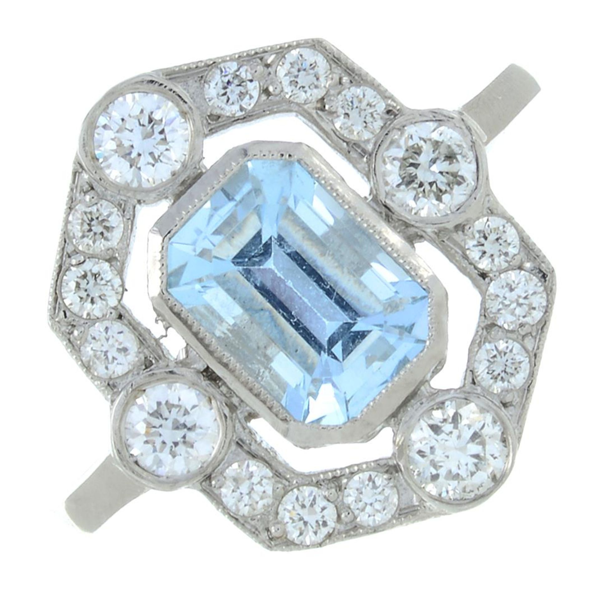 An aquamarine and diamond dress ring.Aquamarine calculated weight 0.92ct,