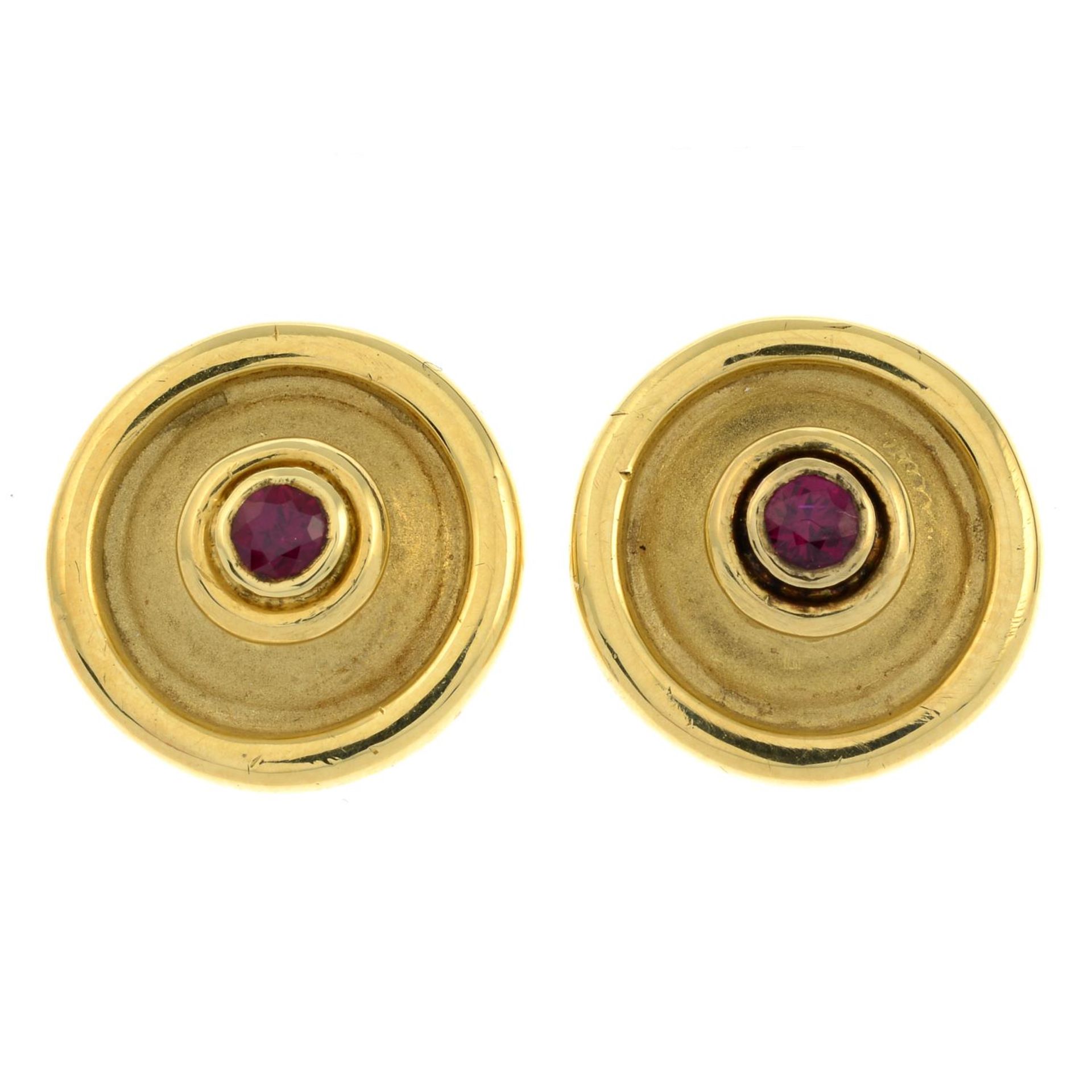 A pair of 18ct gold ruby earrings.