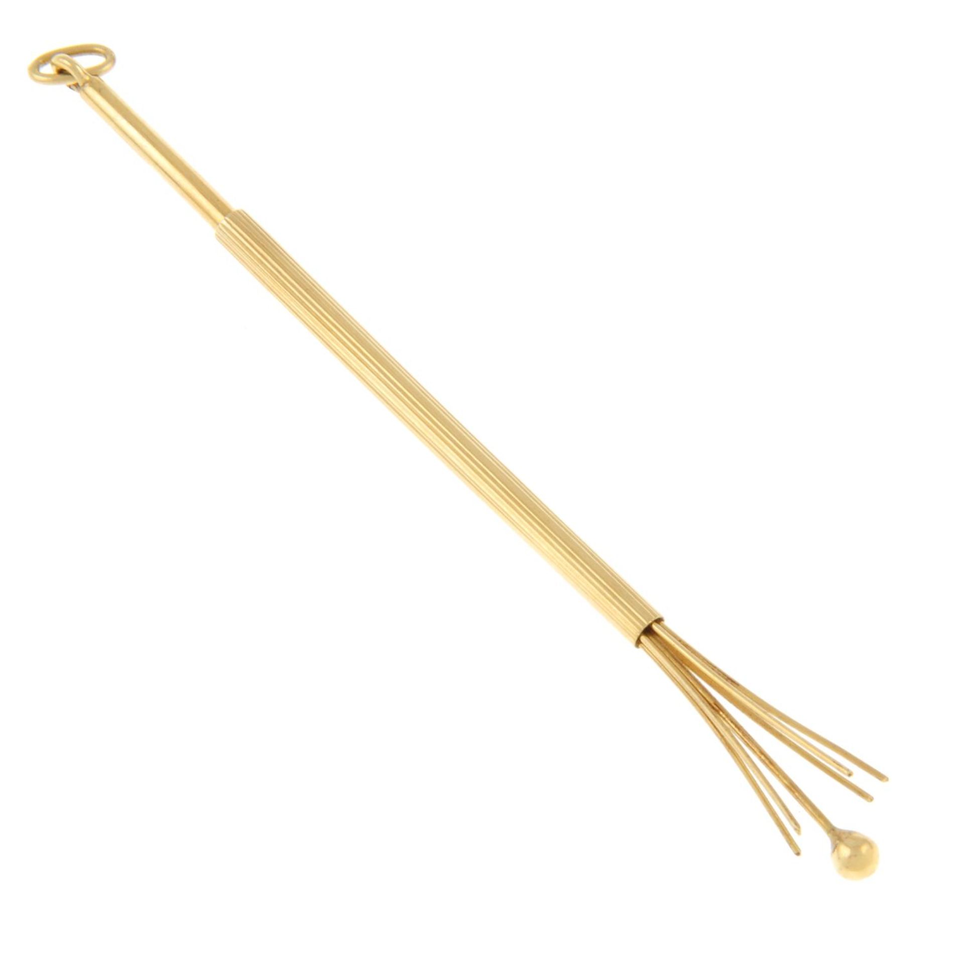 An early 20th century gold cocktail stirrer.Stamped 18k.Length 9.5cms. - Image 2 of 2