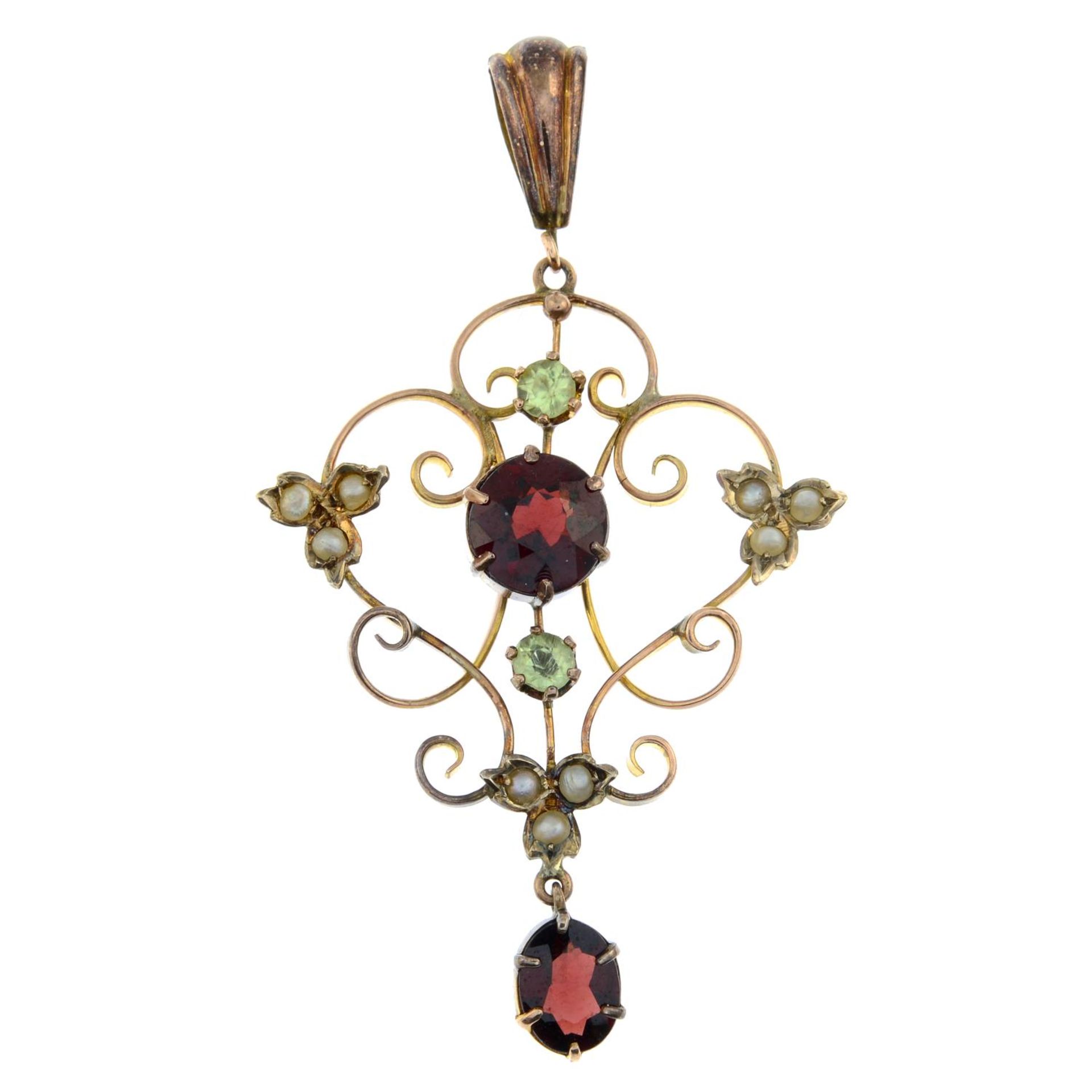 An Edwardian 9ct gold garnet, prasiolite and split pearl pendant.Length 5cms.