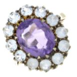 A 9ct gold amethyst and paste cluster ring.Hallmarks for Birmingham, 1973.Ring size P.