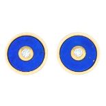 A pair of 18ct gold lapis lazuli and diamond stud earrings.Hallmarks for 18ct gold.Length 0.8cms.