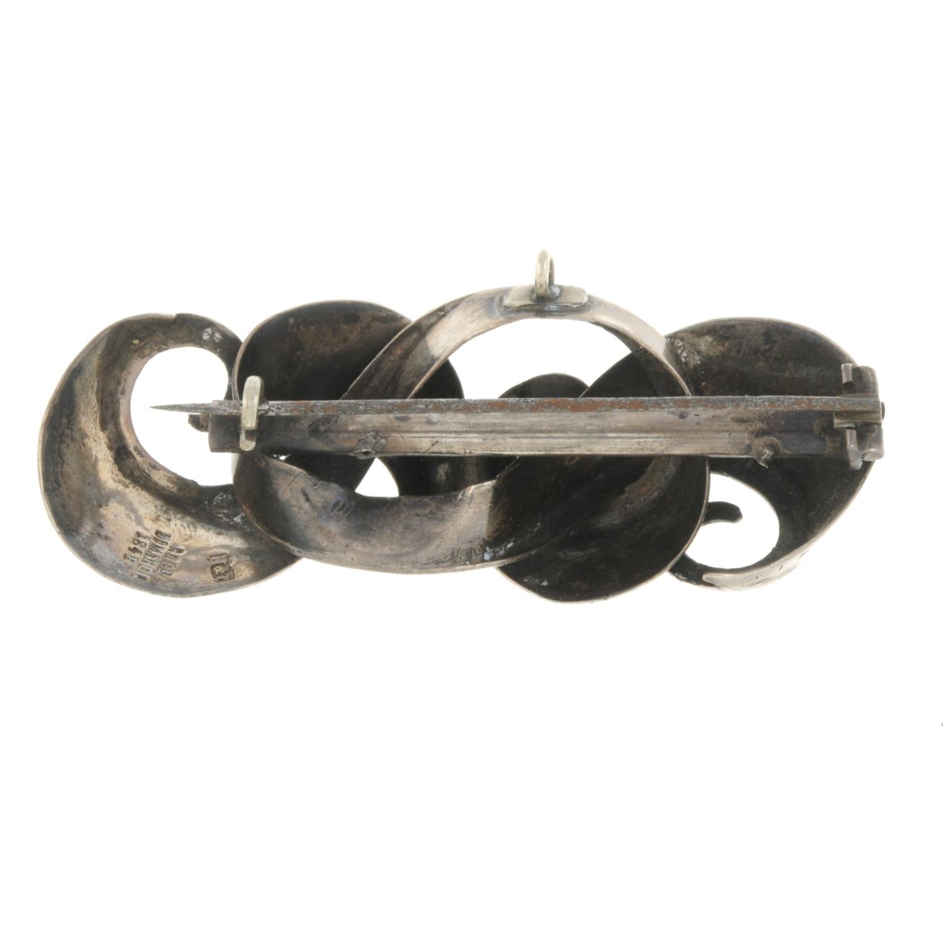 A Victorian engraved brooch, by Hilliard & Thompson.With maker's marks.Length 7cms. - Image 2 of 2