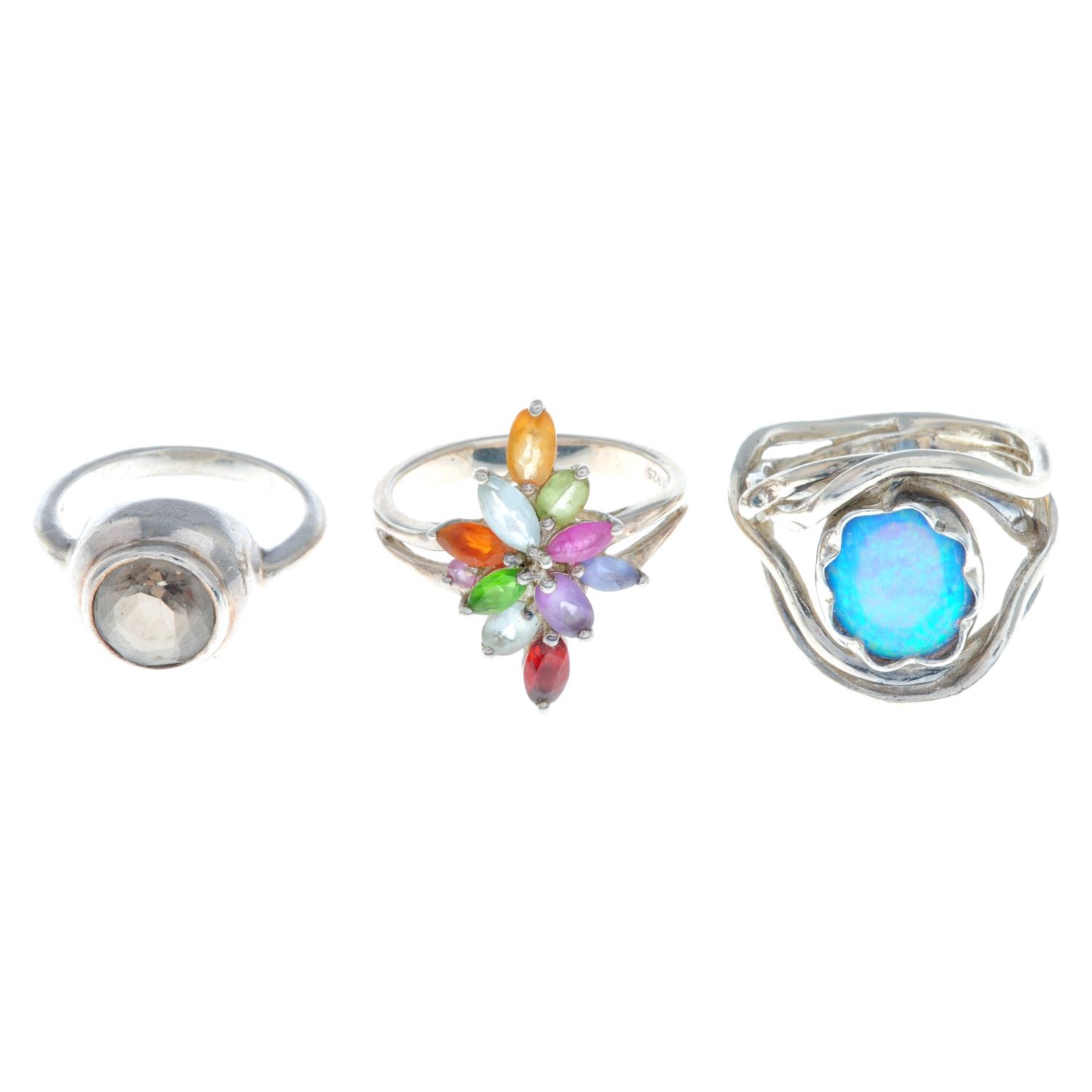 A selection of mainly gem-set rings, to include a garnet cluster ring.