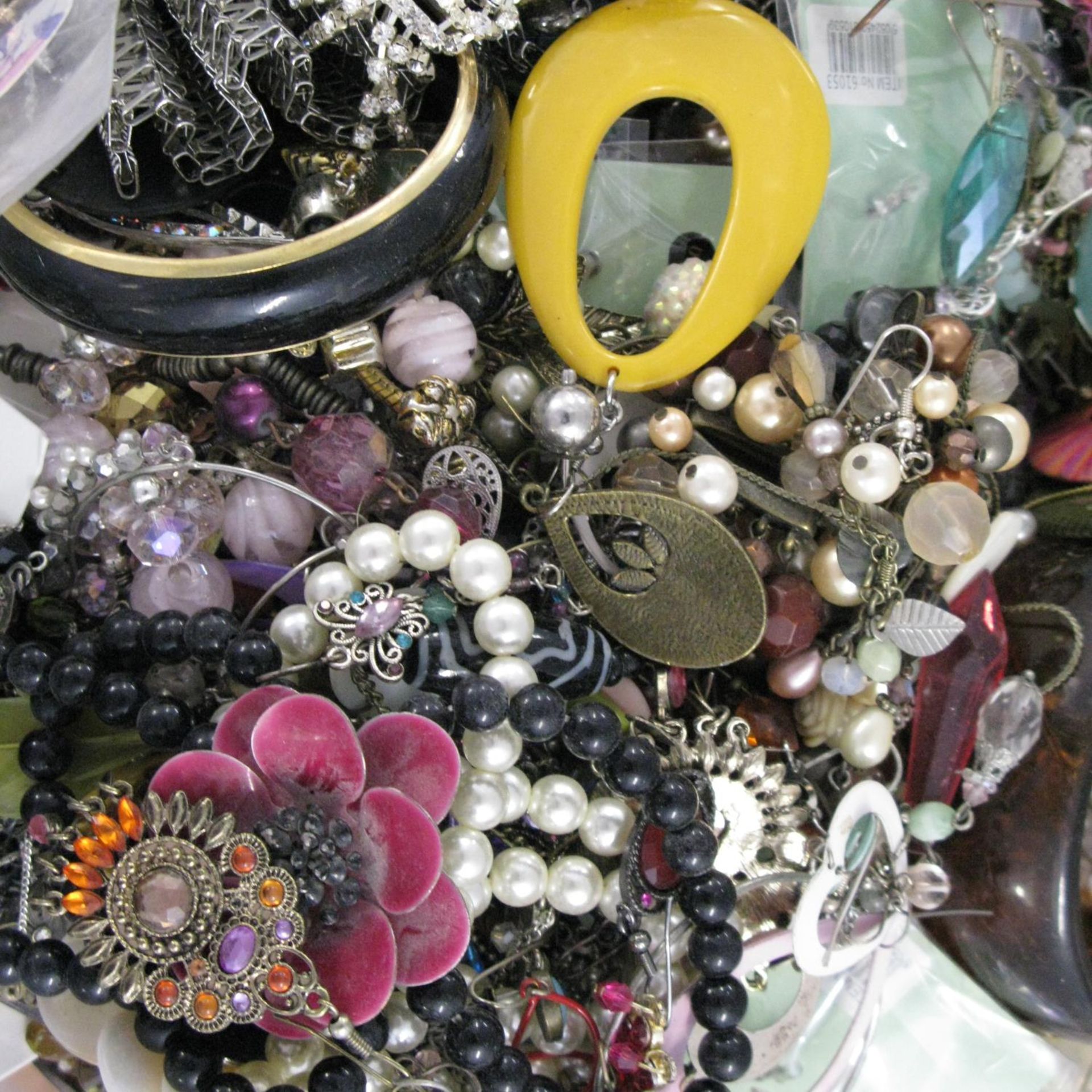 A bag containing a large quantity of costume jewellery. - Image 2 of 2