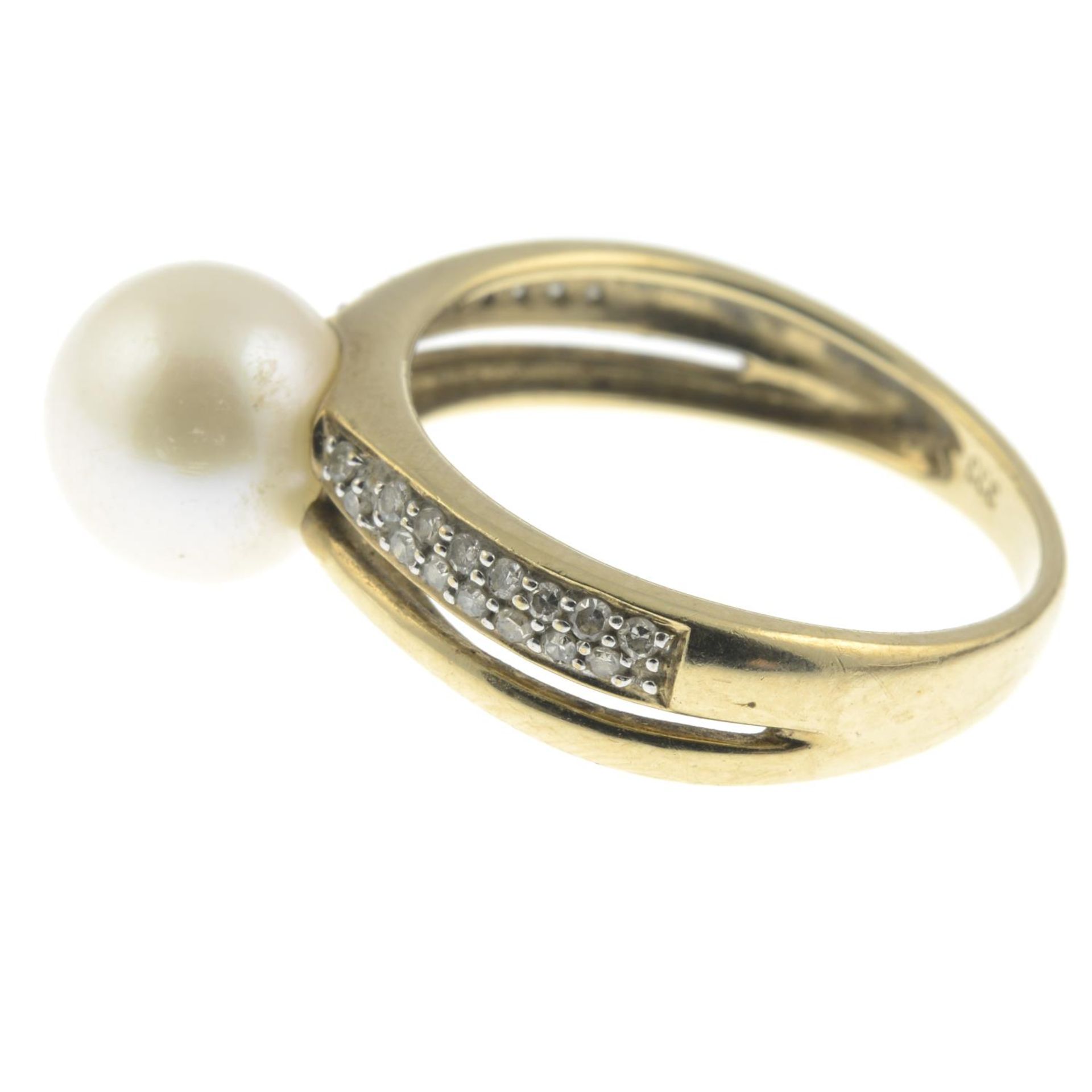 A cultured pearl and diamond ring.Estimated total diamond weight 0.18cts.Stamped 333.Ring size - Image 2 of 3