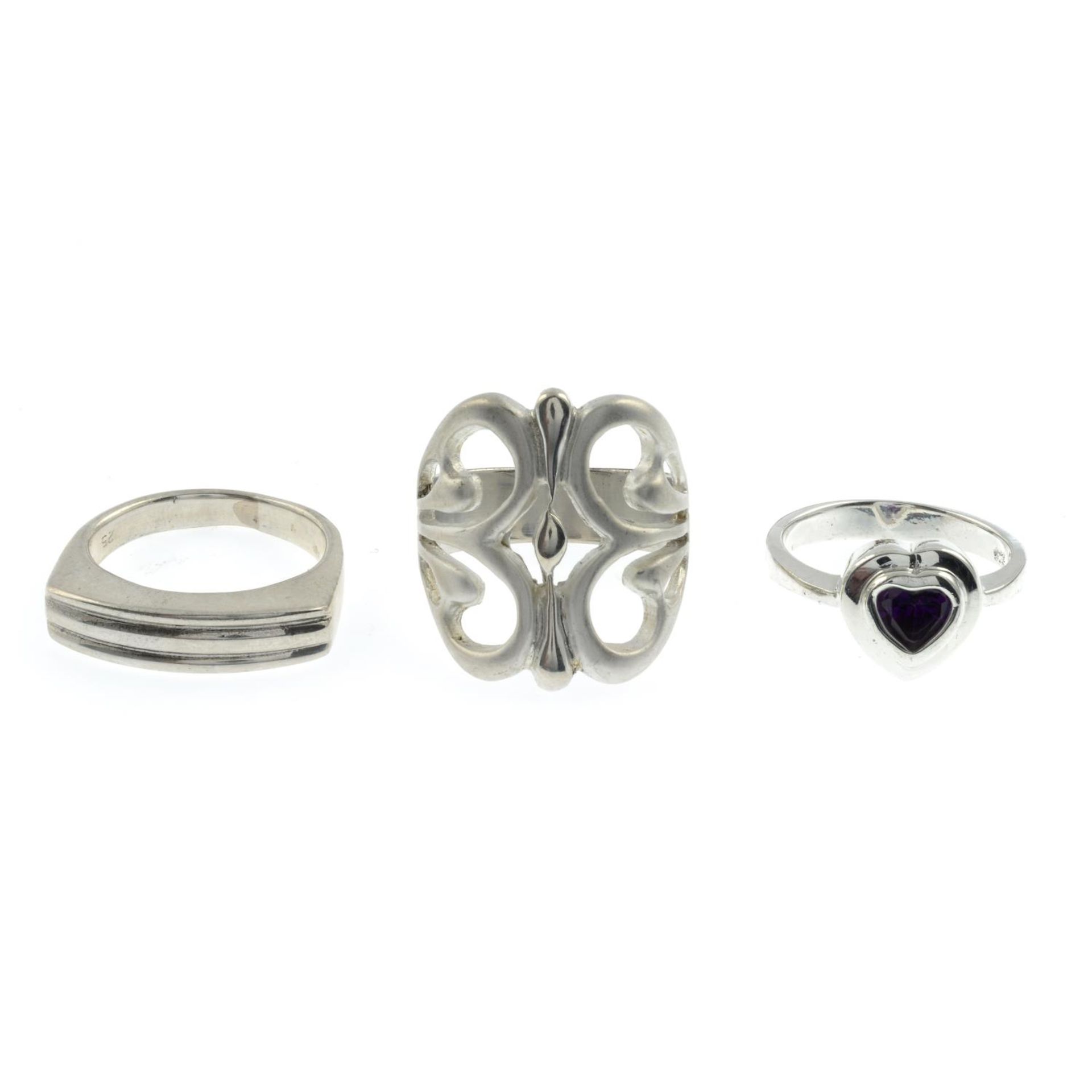 A selection of enamel and gem-set rings.