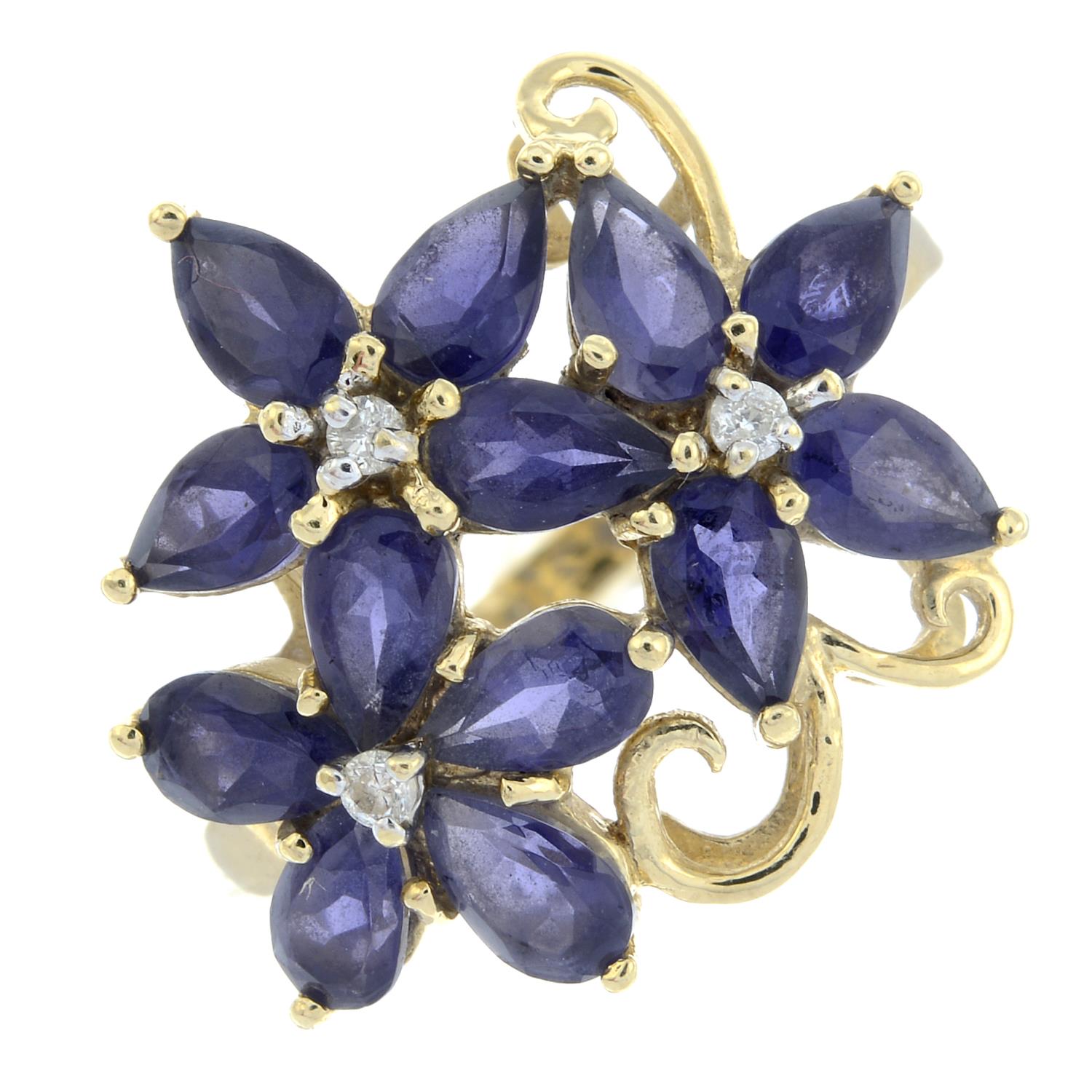 A 9ct gold iolite and diamond dress ring of floral design.Hallmarks for Birmingham.