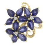 A 9ct gold iolite and diamond dress ring of floral design.Hallmarks for Birmingham.
