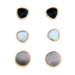 A pair of 9ct gold onyx stud earrings and two pairs of 9ct gold mother-of-pearl stud earrings.All