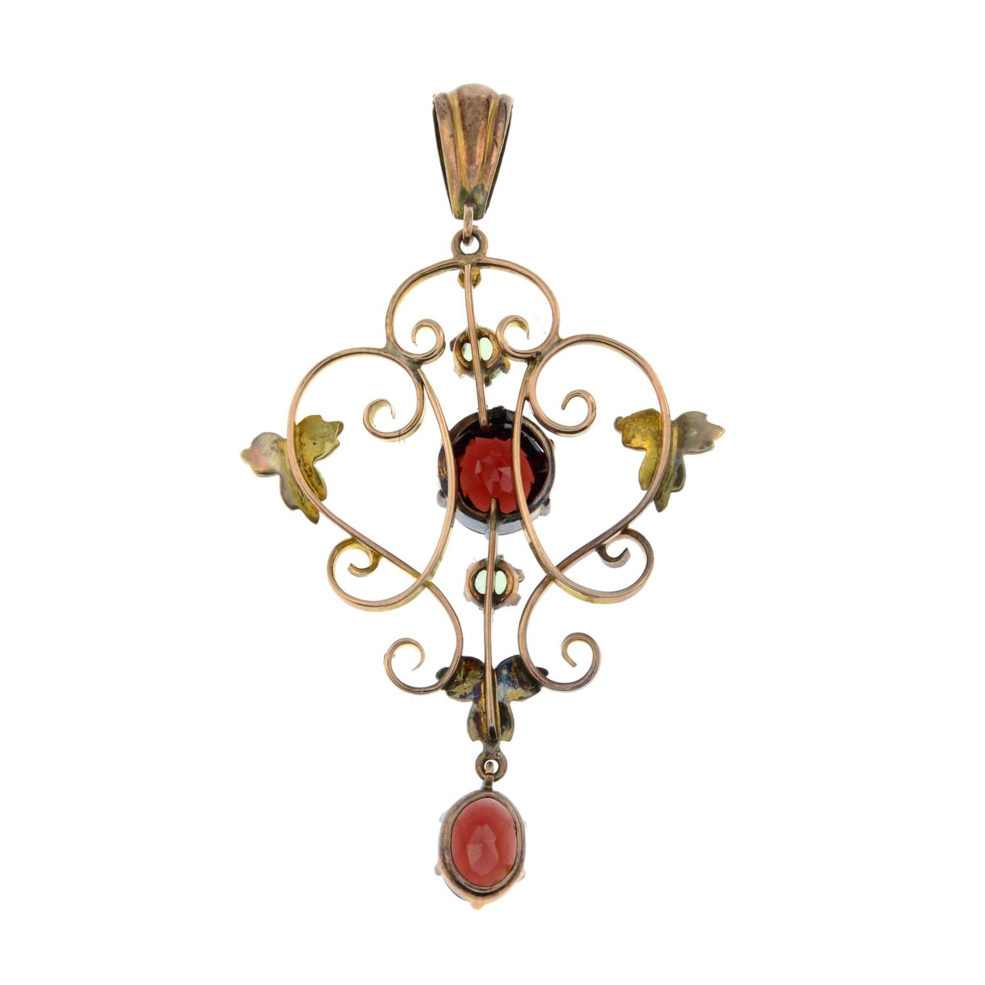 An Edwardian 9ct gold garnet, prasiolite and split pearl pendant.Length 5cms. - Image 2 of 2