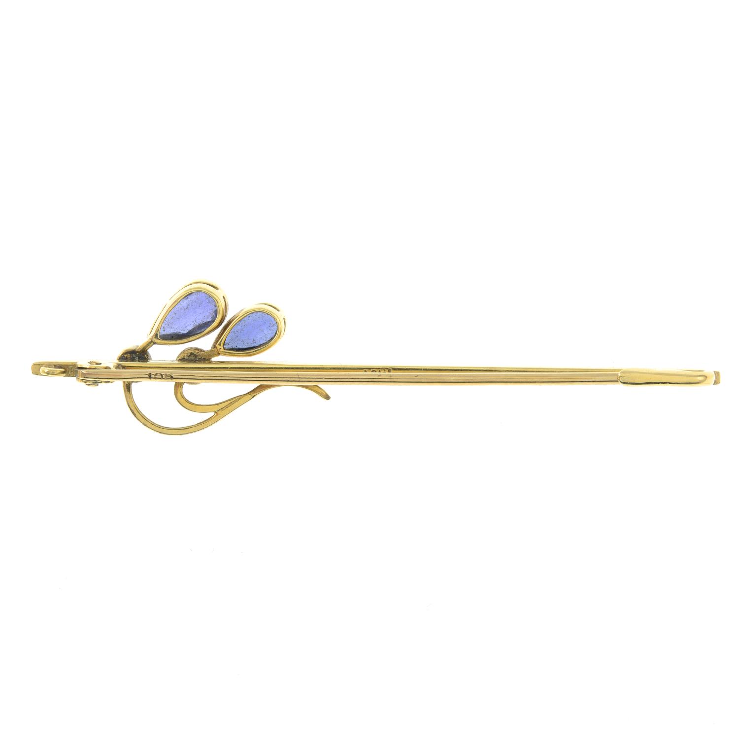 An early 20th century 15ct gold sapphire and split pearl foliate bar brooch.Stamped 15ct.Length - Image 2 of 2