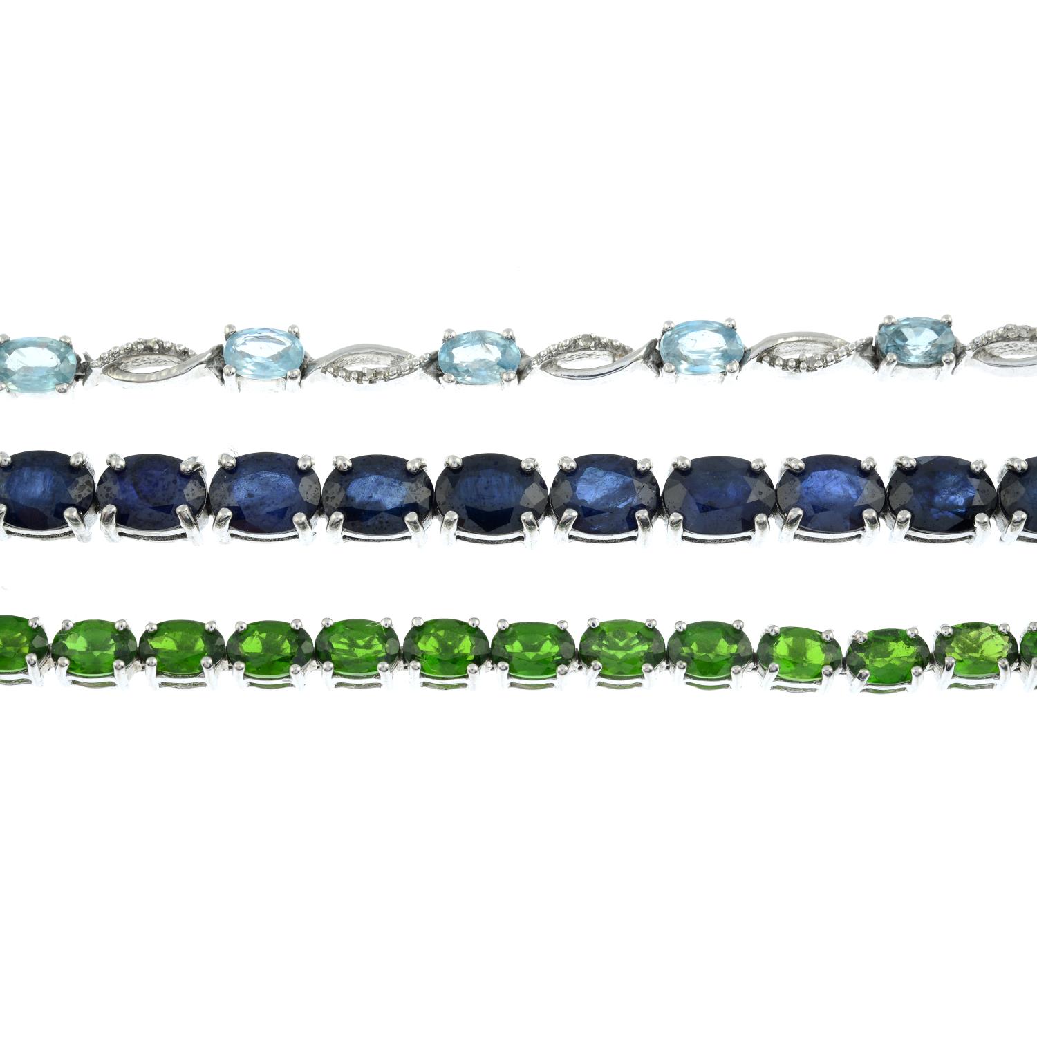 Three silver gem-set line bracelets,