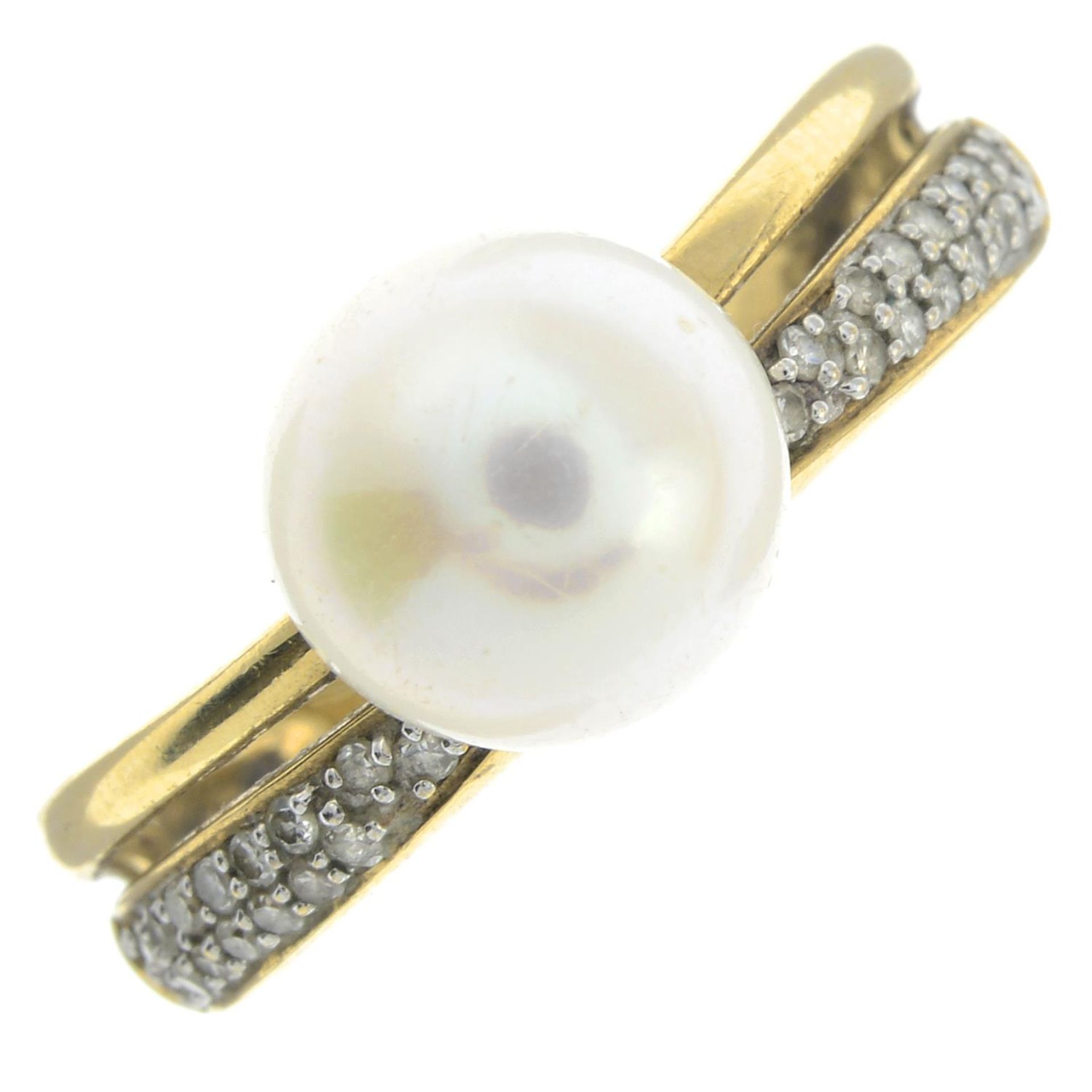 A cultured pearl and diamond ring.Estimated total diamond weight 0.18cts.Stamped 333.Ring size