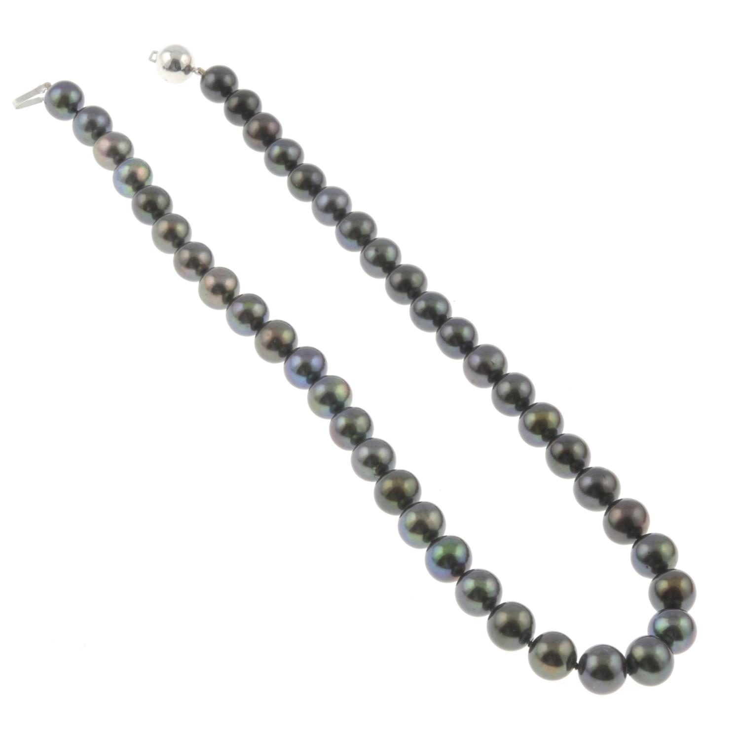 A black cultured freshwater pearl necklace.Clasp stamped 750. - Image 2 of 2