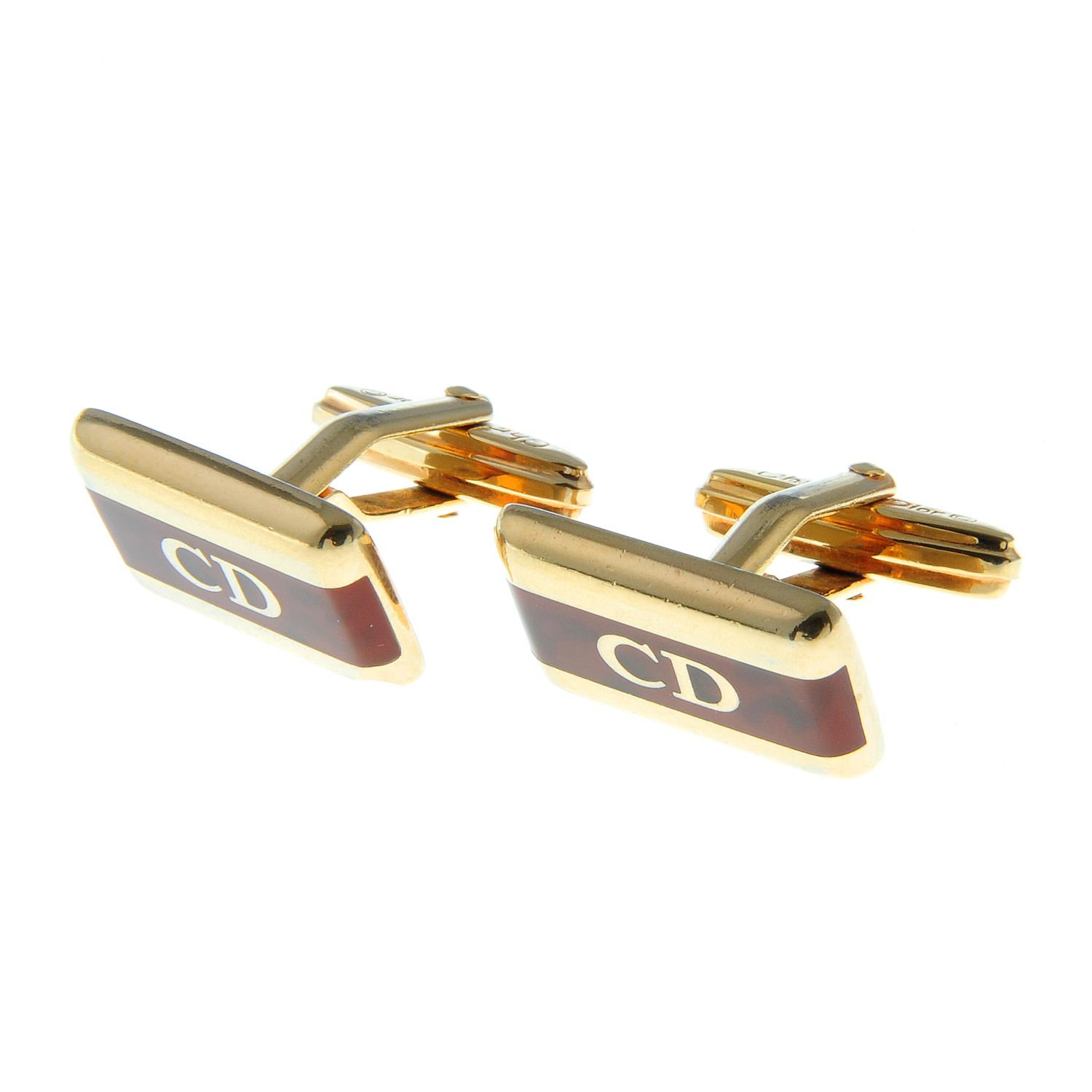 A pair of imitation tortoise shell cufflinks, by Christian Dior.Signed Chr. - Image 3 of 3