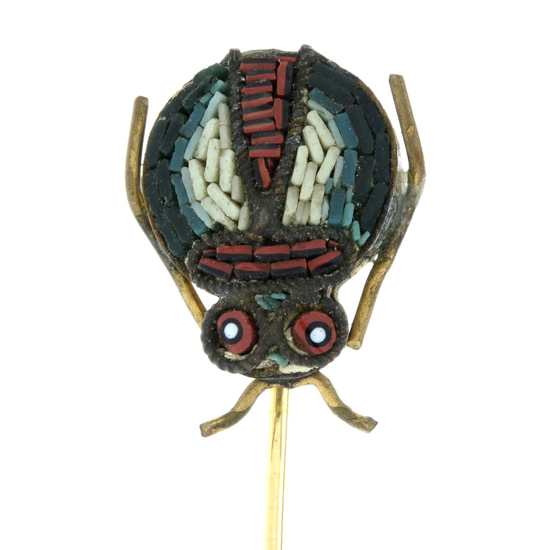 A micro mosaic stickpin of a beetle.Length of stickpin head 1.9cms.