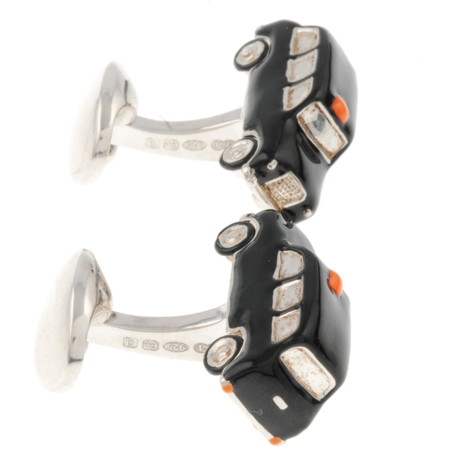 A pair of silver and enamel taxi cufflinks with rotating from wheels, - Image 2 of 3