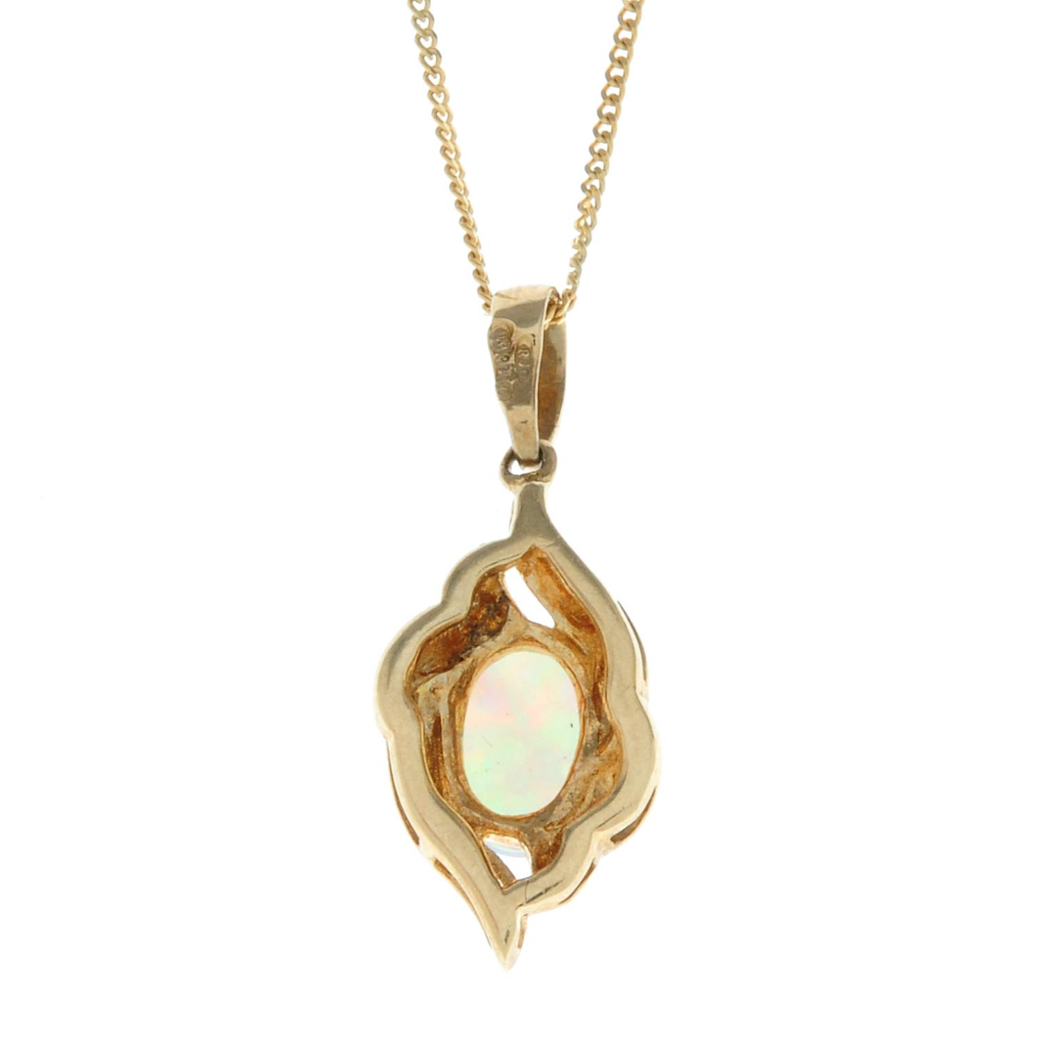 A 9ct gold opal pendant, with chain.Hallmarks for Sheffield.Length of pendant 2.1cms. - Image 2 of 3
