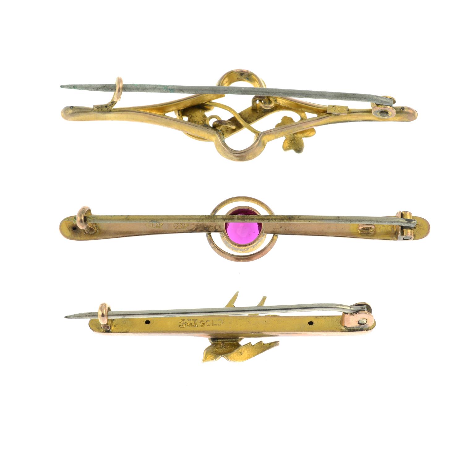 A synthetic ruby bar brooch, along with a seed two seed pearl brooches. - Image 2 of 2