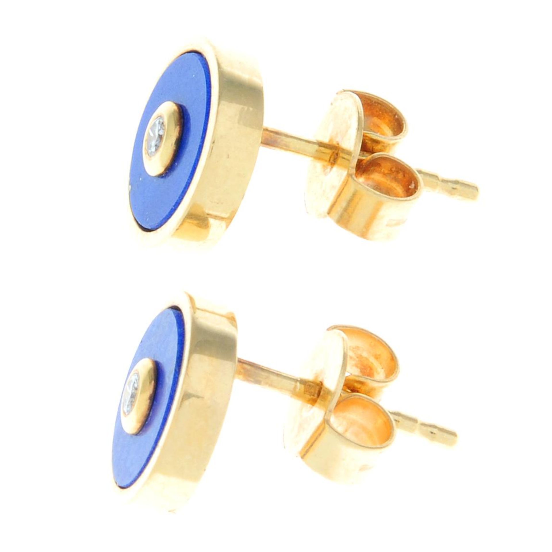A pair of 18ct gold lapis lazuli and diamond stud earrings.Hallmarks for 18ct gold.Length 0.8cms. - Image 2 of 2