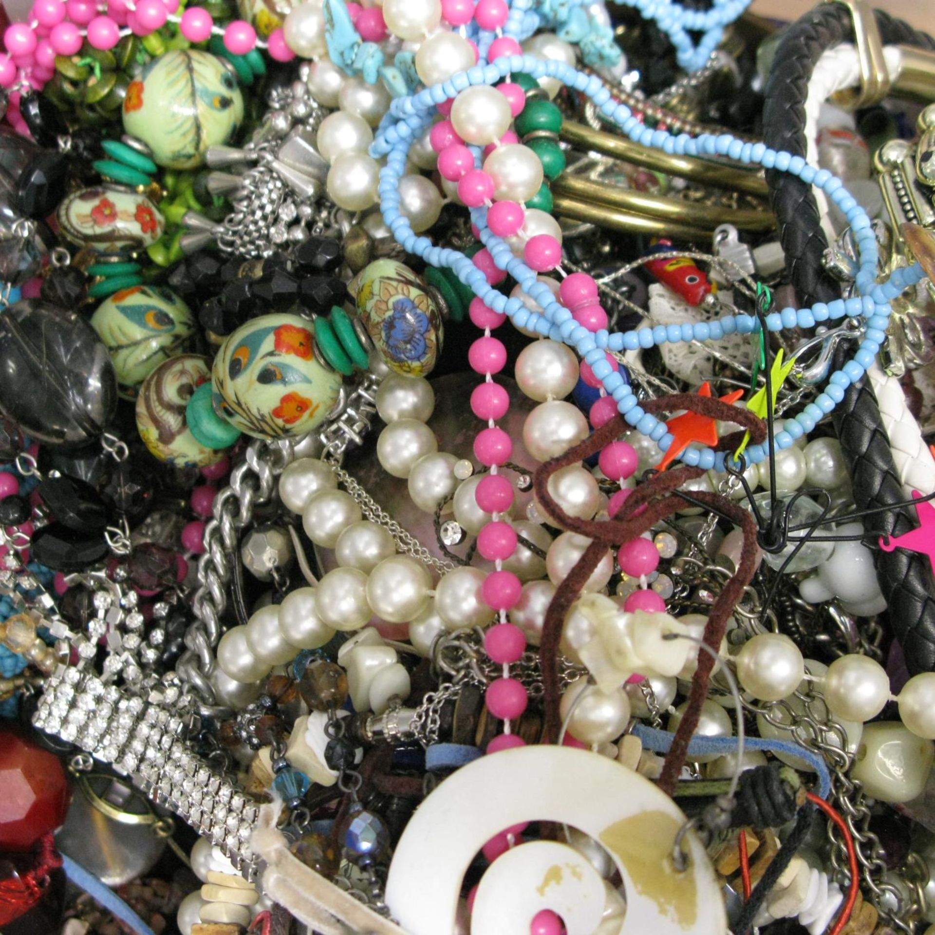 A bag containing a large quantity of costume jewellery. - Image 2 of 2