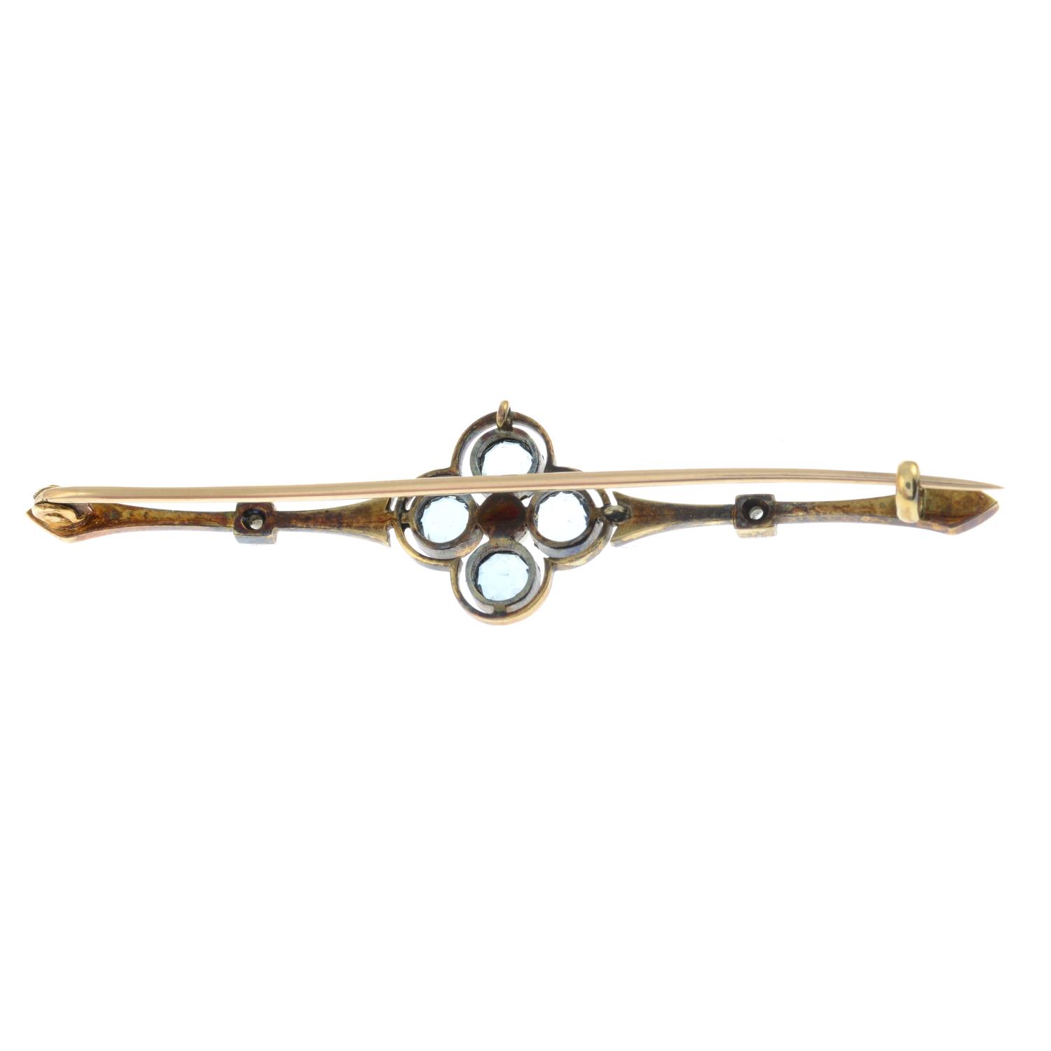 A diamond, aquamarine and seed pearl bar brooch.Stamped 15ct.Length 6.1cms. - Image 2 of 2