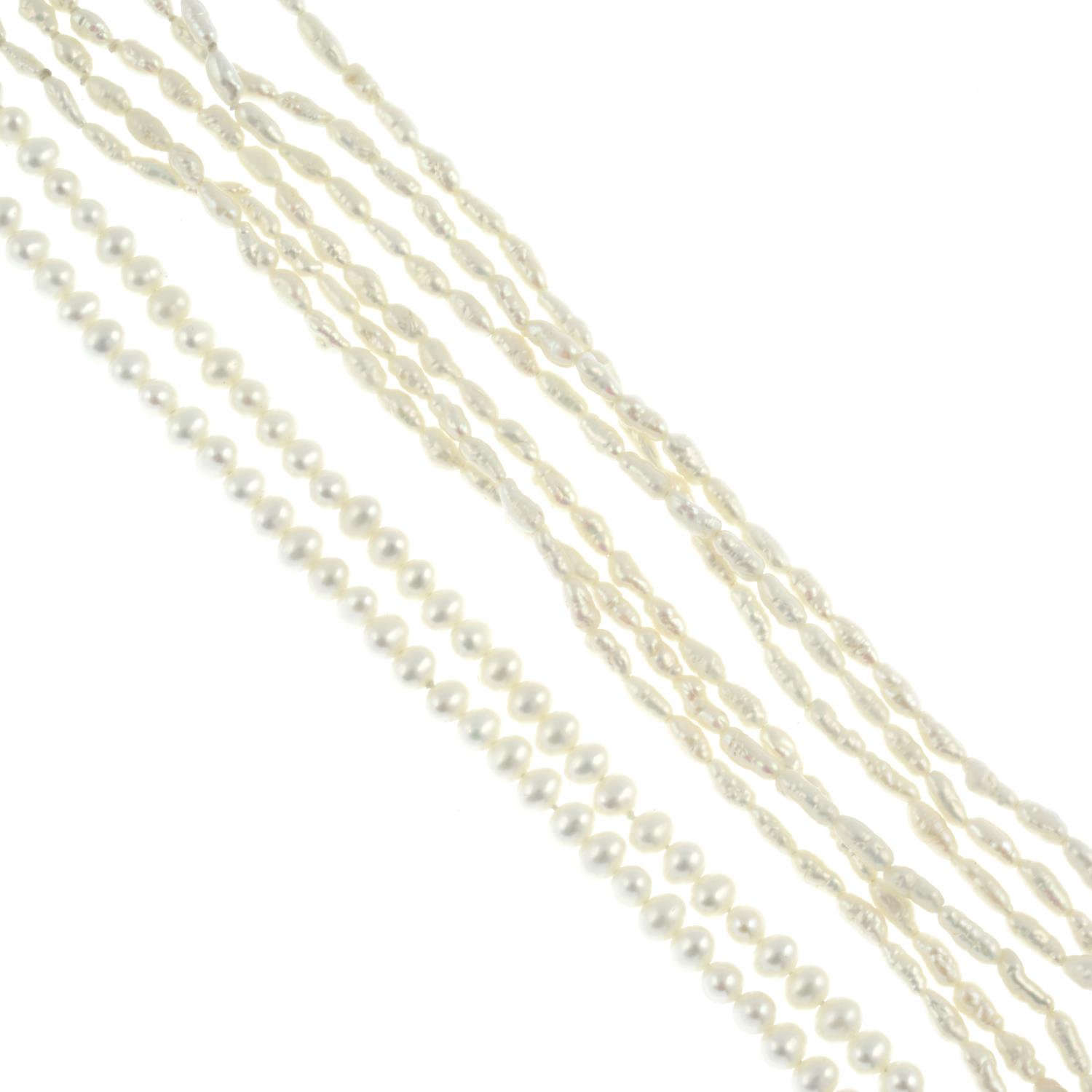 Three cultured pearl necklaces.