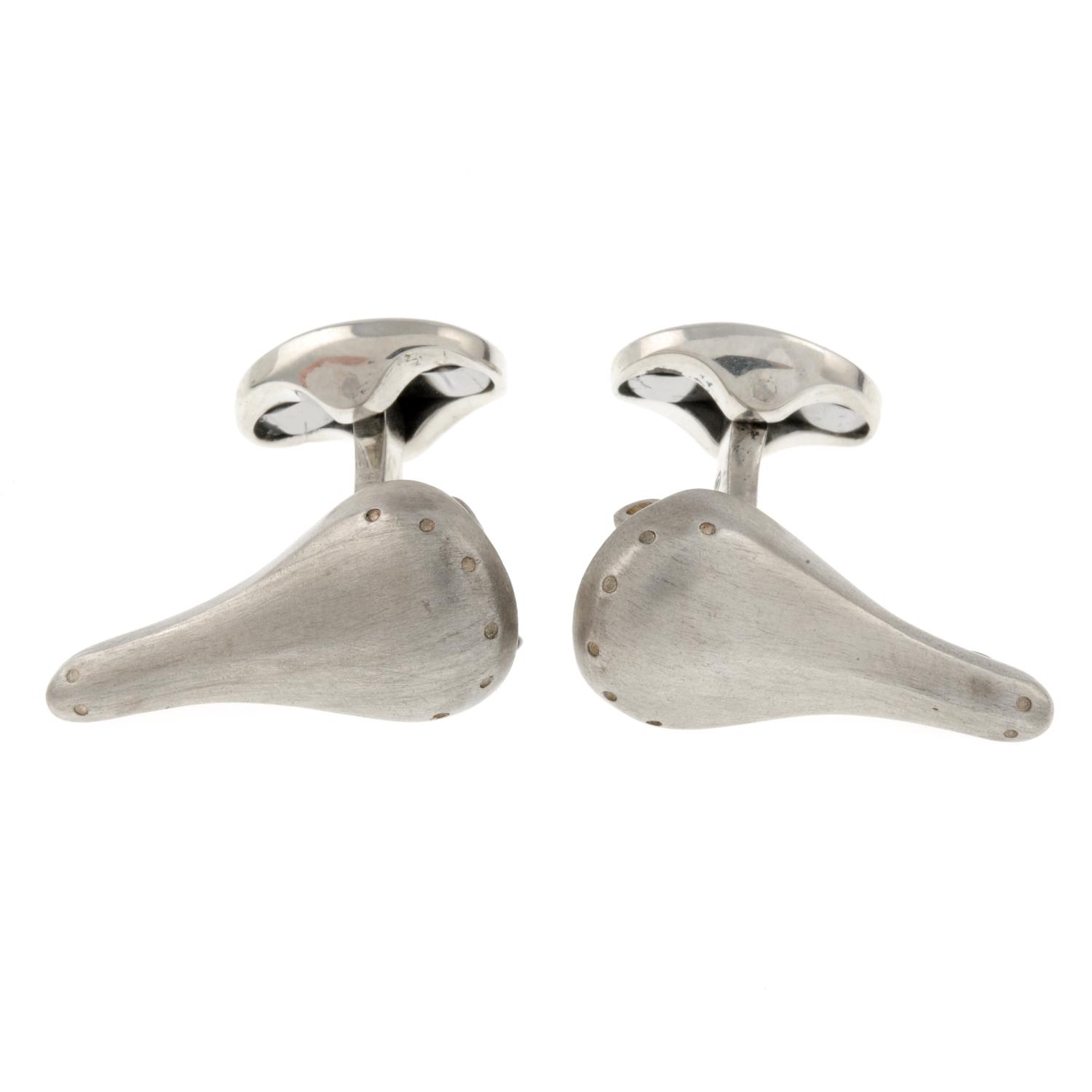 A pair of silver bicycle seat cufflinks, by Deakin and Francis.Signed D&F.