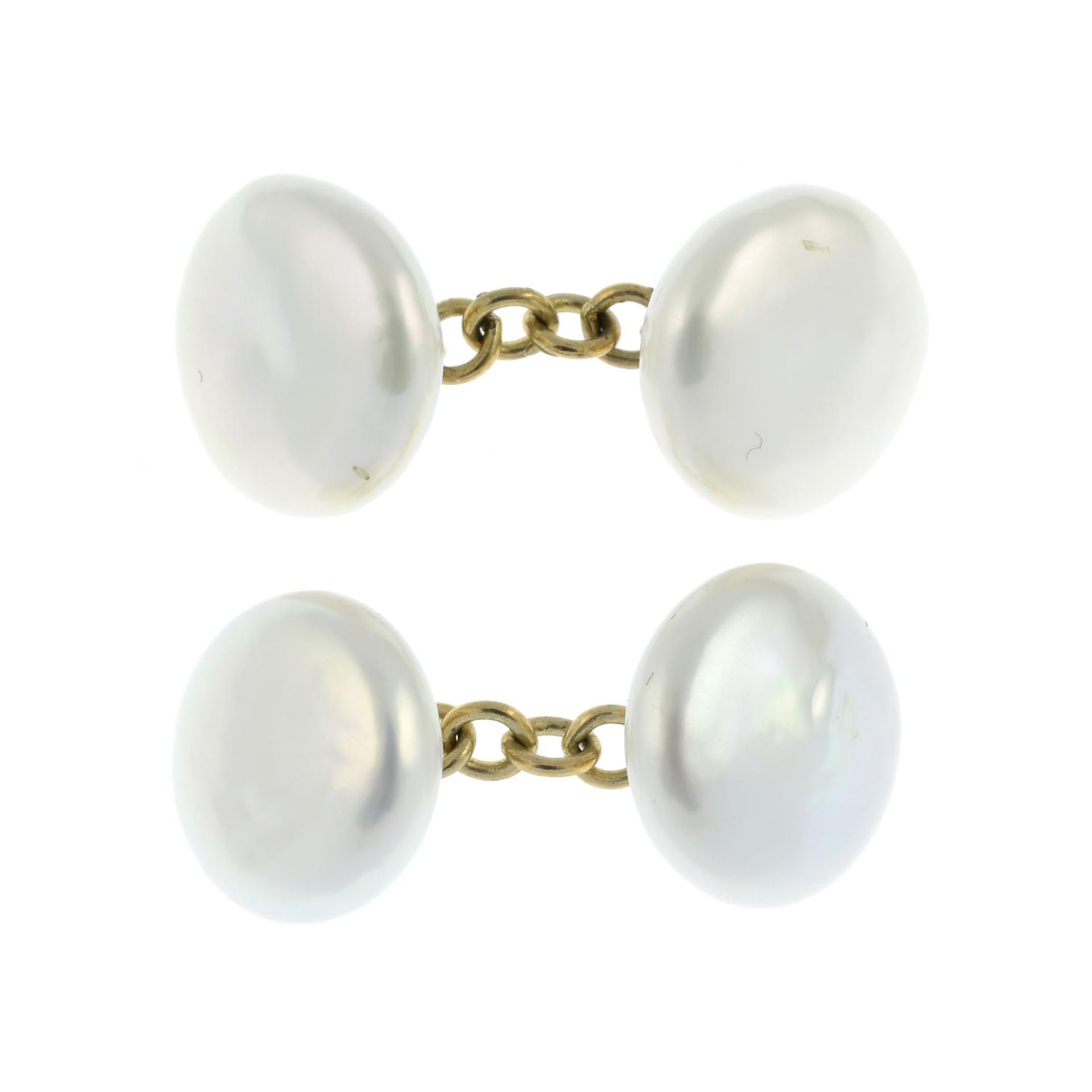 A pair of cultured pearl cufflinks.Length of cufflink faces 1.3cms.