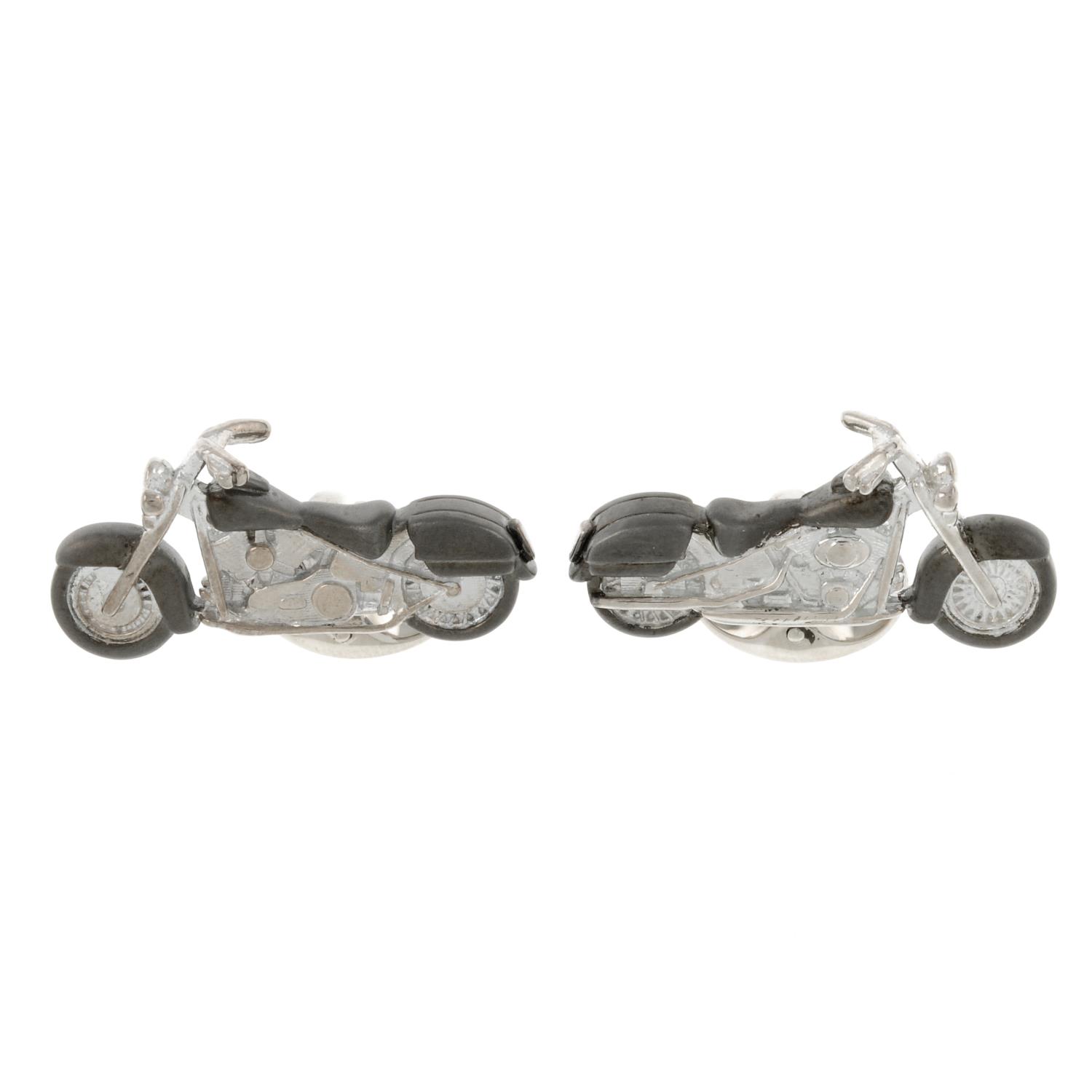 A pair of silver motorcycle cufflinks, by Deakin and Francis.Signed D&F.