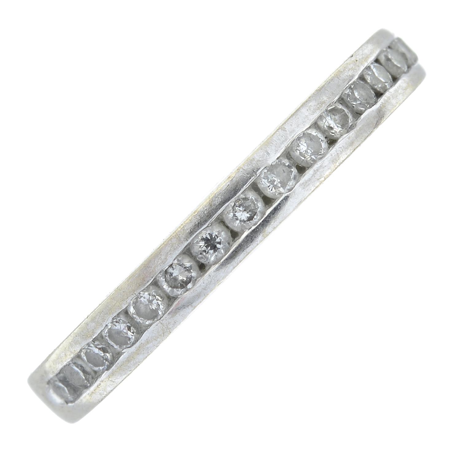 A 9ct gold diamond half eternity ring.Total diamond weight 0.2cts stamped to band.Hallmarks for