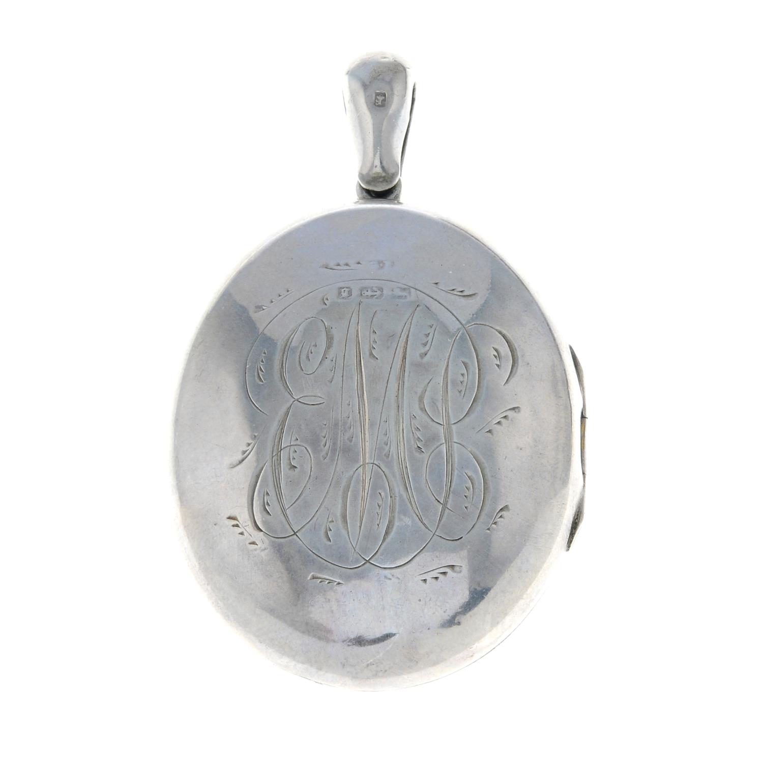 A late Victorian silver engraved locket with an ivy leaf pattern to the reverse.Hallmarks for - Image 2 of 2