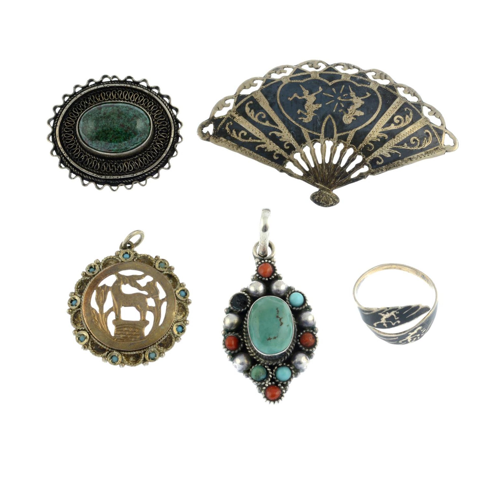 A selection of international jewellery, to include a brooch of a fan with suspended tassels.