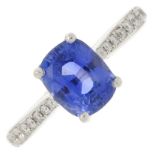 A sapphire and brilliant-cut diamond dress ring.Sapphire weight 2.01cts.Total diamond weight