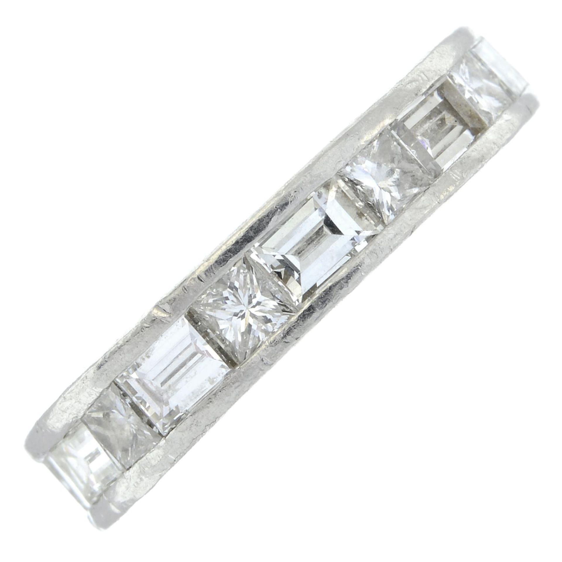 A vari-cut diamond half eternity ring.Estimated total diamond weight 1.10cts,