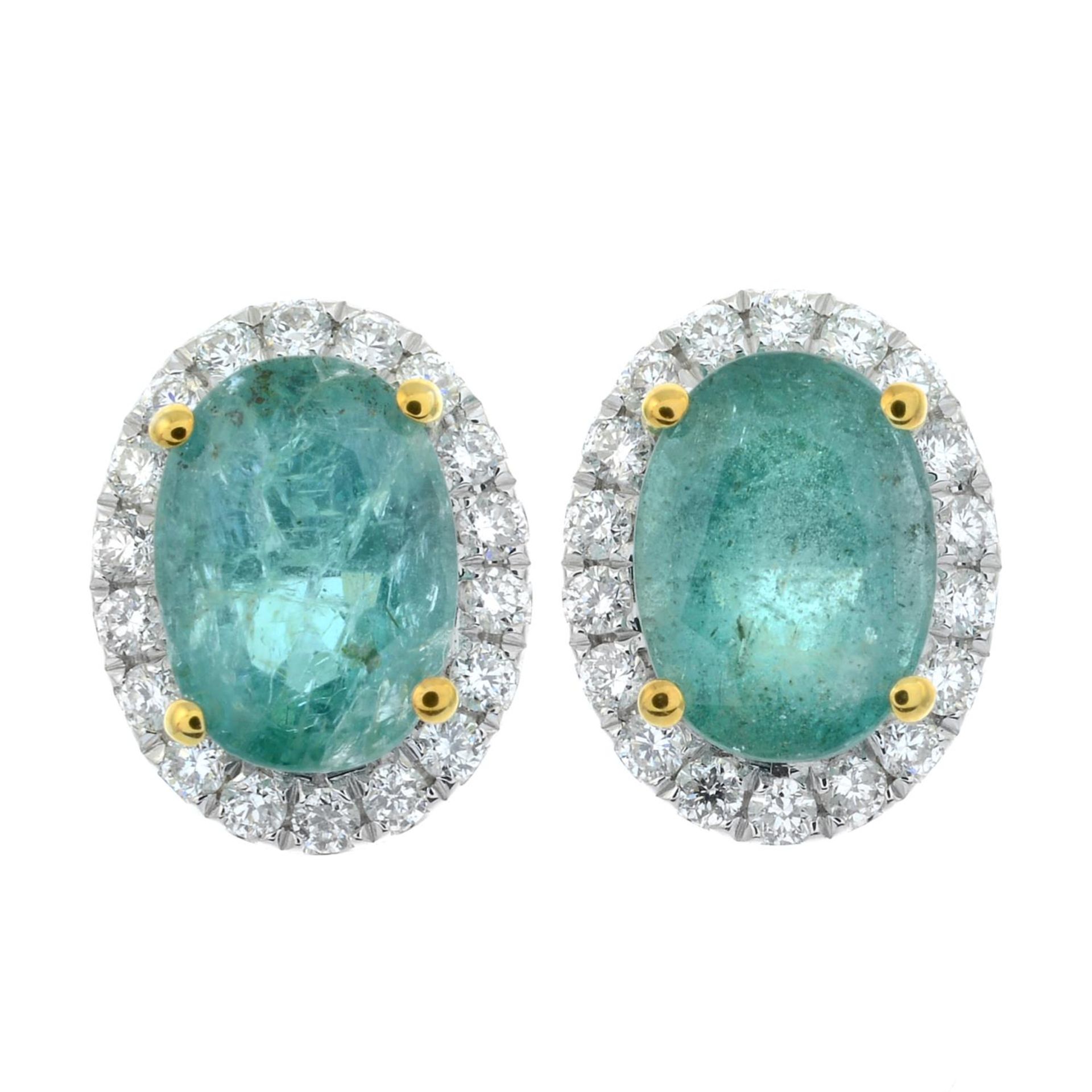 A pair of emerald and brilliant-cut diamond cluster earrings.Total emerald weight 0.80ct,