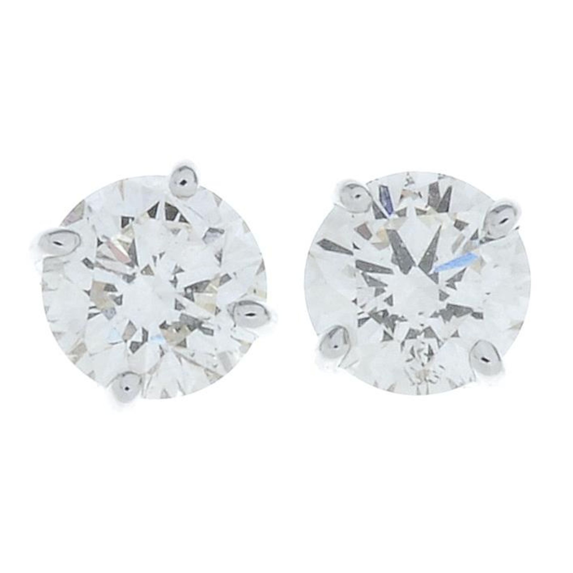 A pair of 18ct gold brilliant-cut diamond single-stone stud earrings.