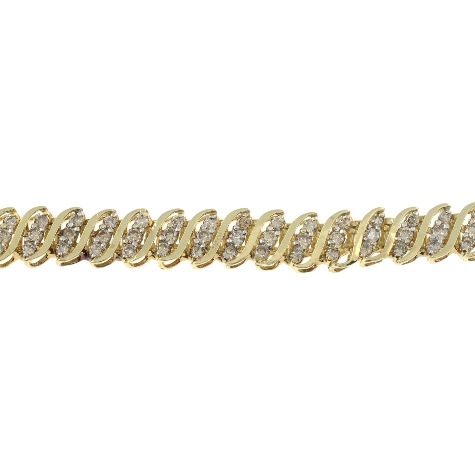 A brilliant-cut diamond bracelet.Estimated total diamond weight 3cts.Stamped 10K.Length 18cms.