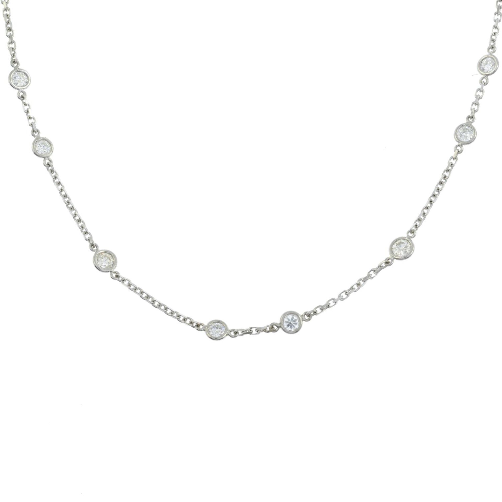An 18ct gold brilliant-cut diamond necklace.Estimated total diamond weight 0.60ct.Hallmarks for