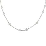 An 18ct gold brilliant-cut diamond necklace.Estimated total diamond weight 0.60ct.Hallmarks for