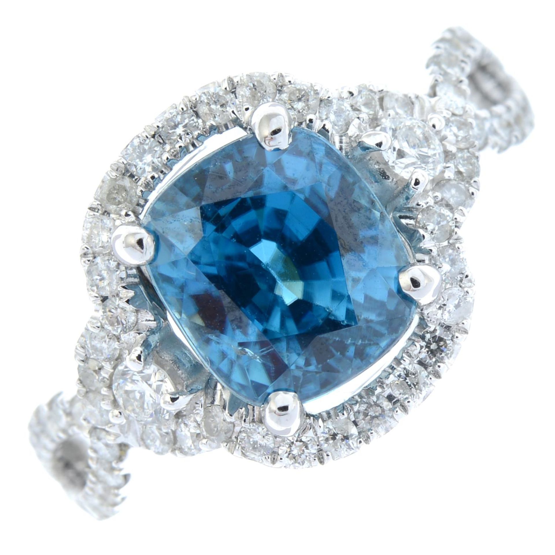 A blue zircon and brilliant-cut diamond ring.Zircon calculated weight 4cts,