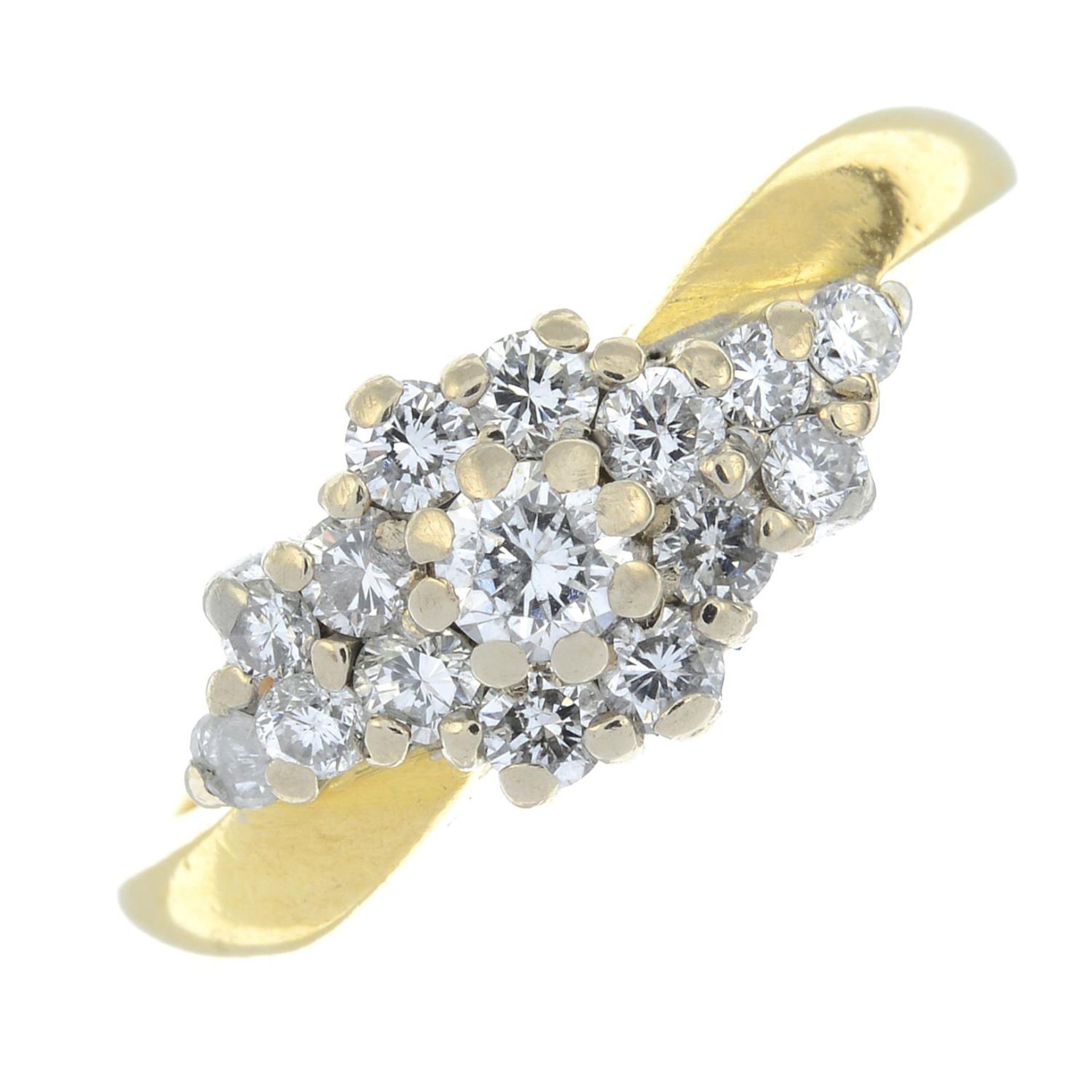 An 18ct gold brilliant-cut diamond cluster ring.Estimated total diamond weight 0.50ct.Hallmarks for