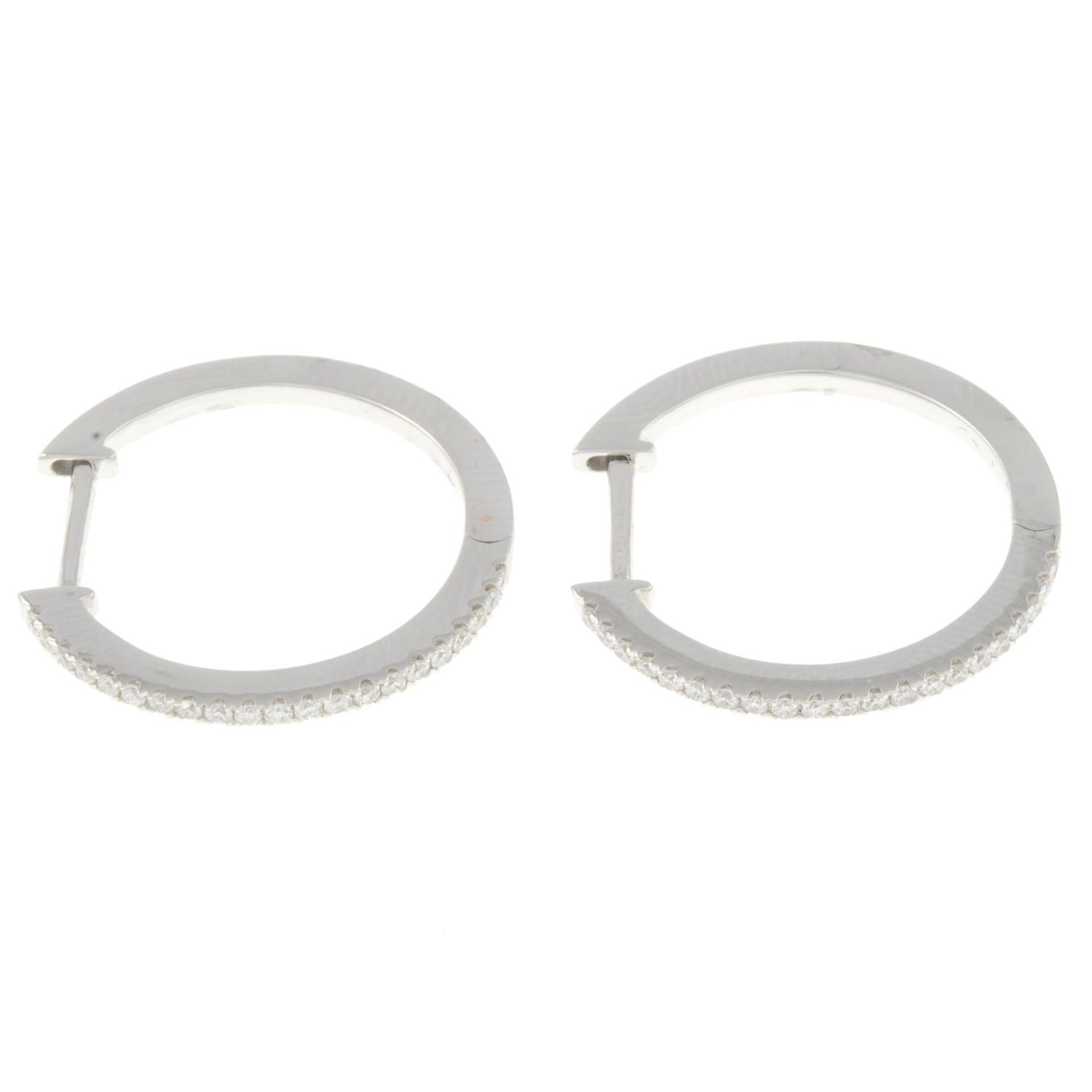 A pair of 18ct gold brilliant-cut diamond hoop earrings, - Image 2 of 4