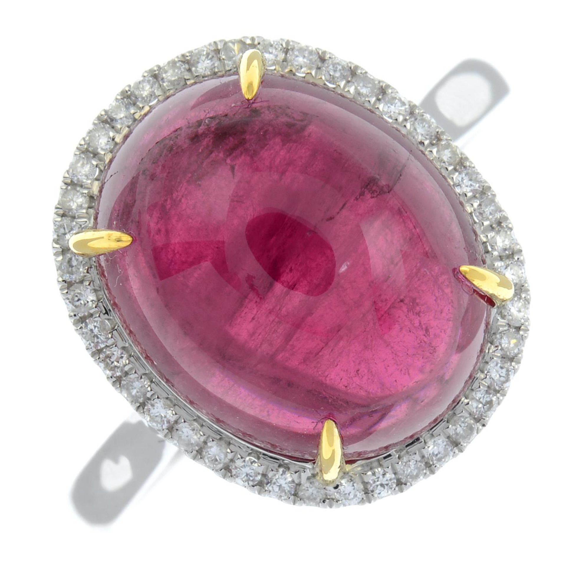 A pink tourmaline and brilliant-cut diamond cluster ring.Tourmaline weight 8.10cts,