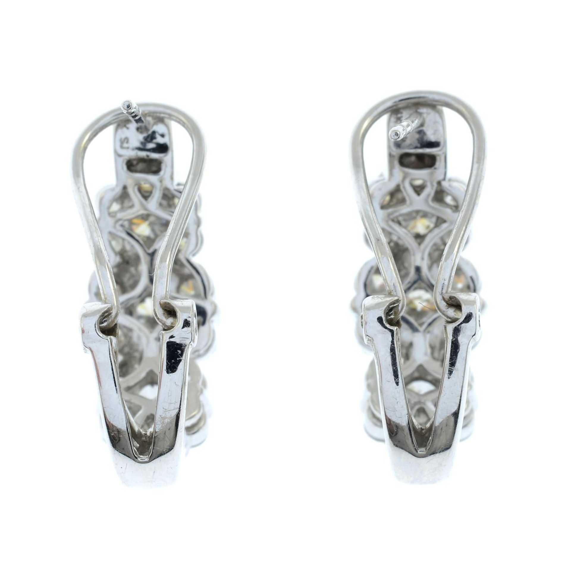 A pair of brilliant-cut diamond triple cluster earrings. - Image 2 of 3